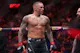 Dustin Poirier reacts after defeating Benoit Saint Denis as we look at the latest UFC 302 odds & lines.