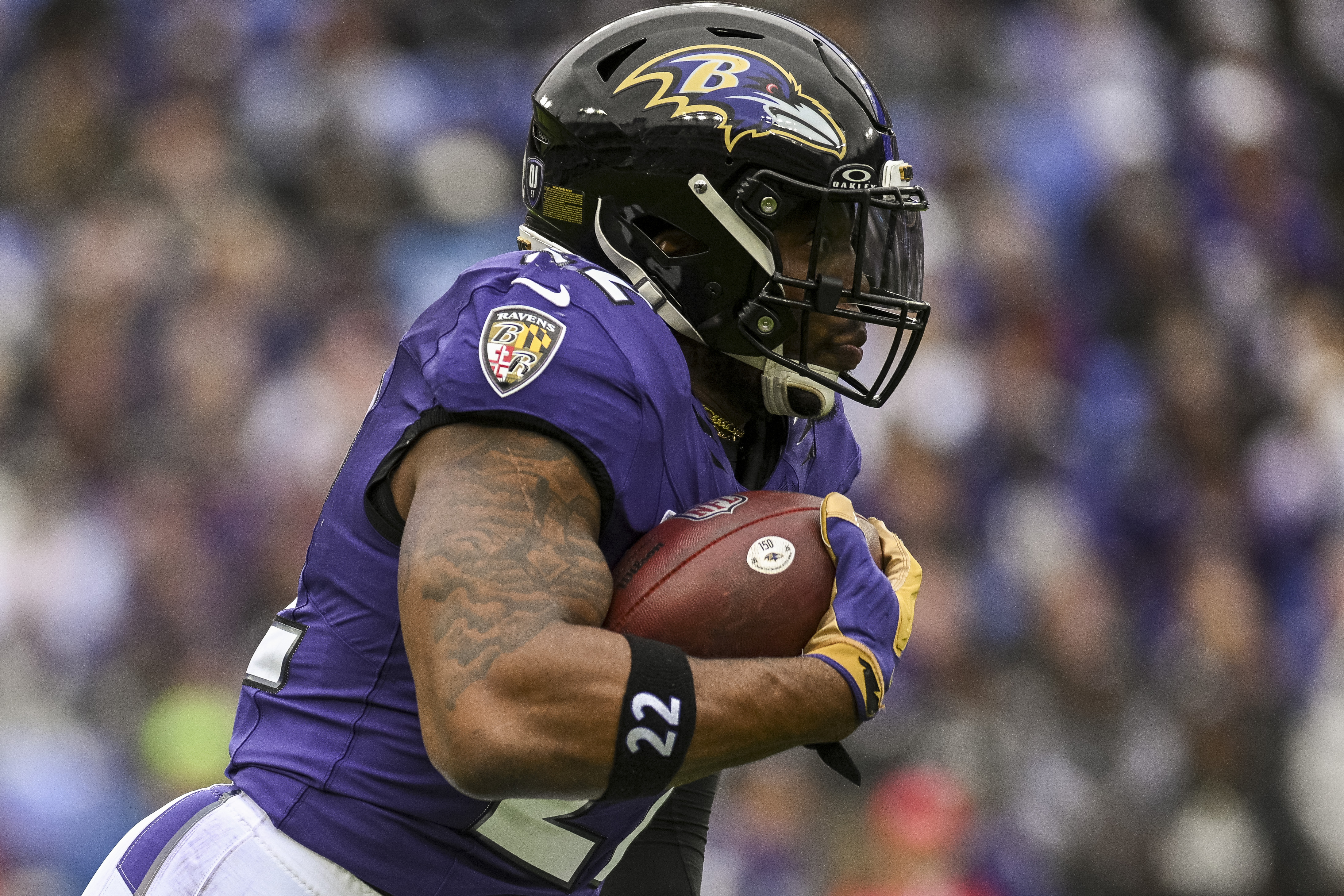 Baltimore Ravens running back Derrick Henry (22) rushes as he is featured in our Ravens vs. Falcons touchdown scorer pick.