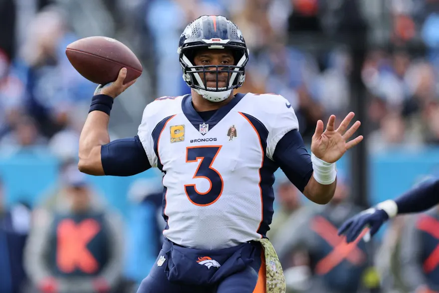 Russell Wilson of the Denver Broncos attempts a pass against the Tennessee Titans at Nissan Stadium on Nov. 13, 2022 in Nashville, Tennessee.