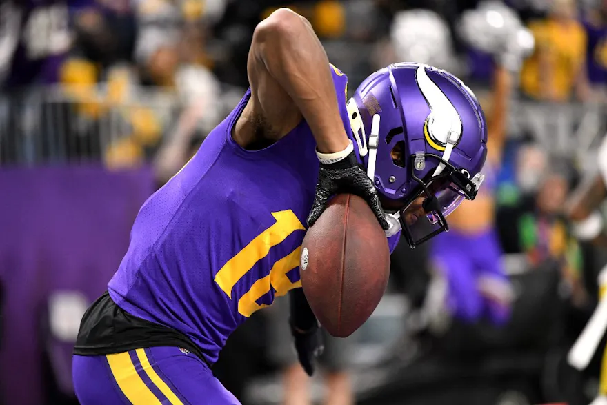 Justin Jefferson of the Minnesota Vikings reacts after scoring a touchdown against the Pittsburgh Steelers in the first quarter of the game at U.S. Bank Stadium on December 09, 2021 in Minneapolis, Minnesota.