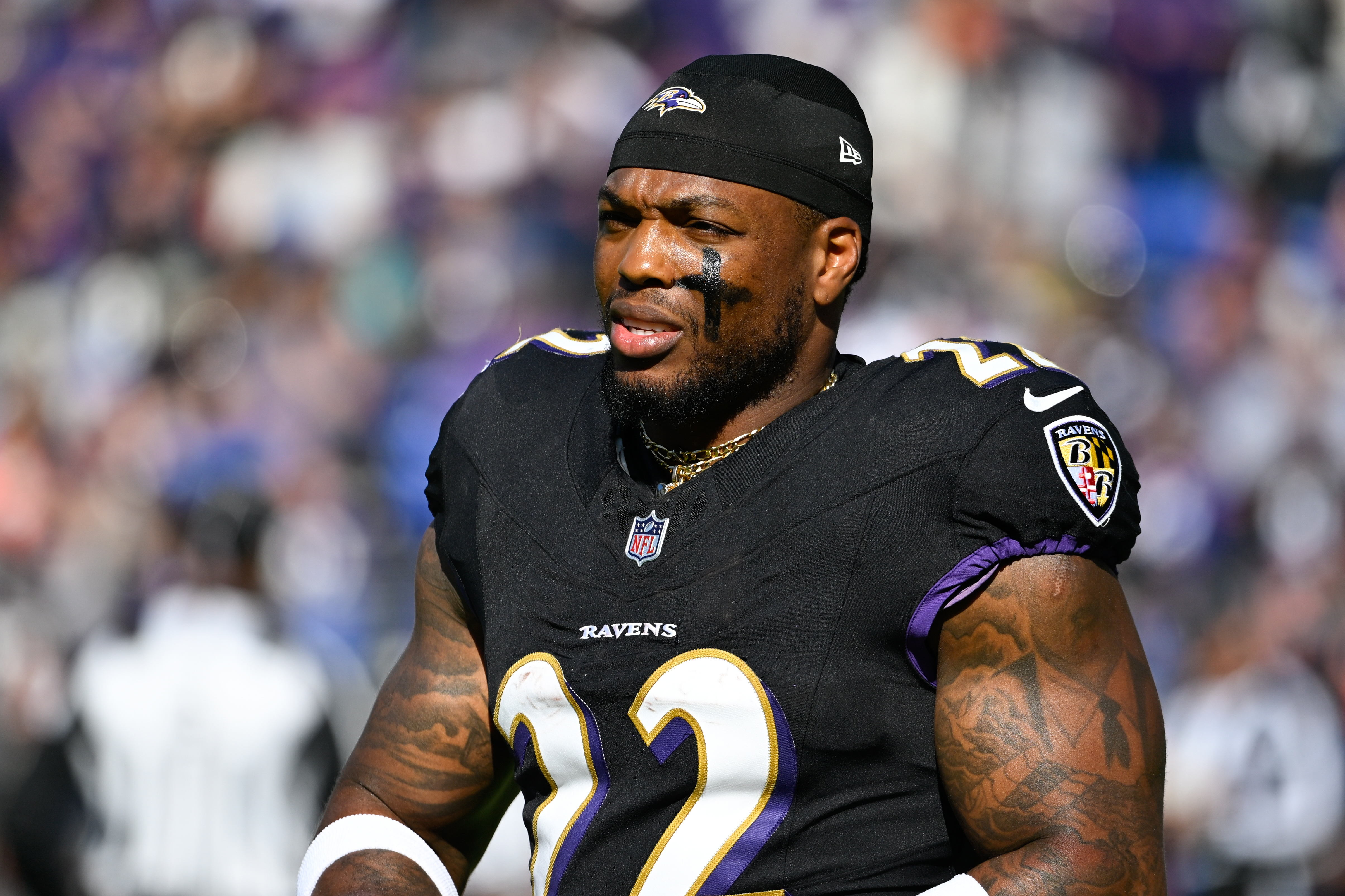 Baltimore Ravens running back Derrick Henry (22) looks on as we offer our Patriots vs. Ravens player props.