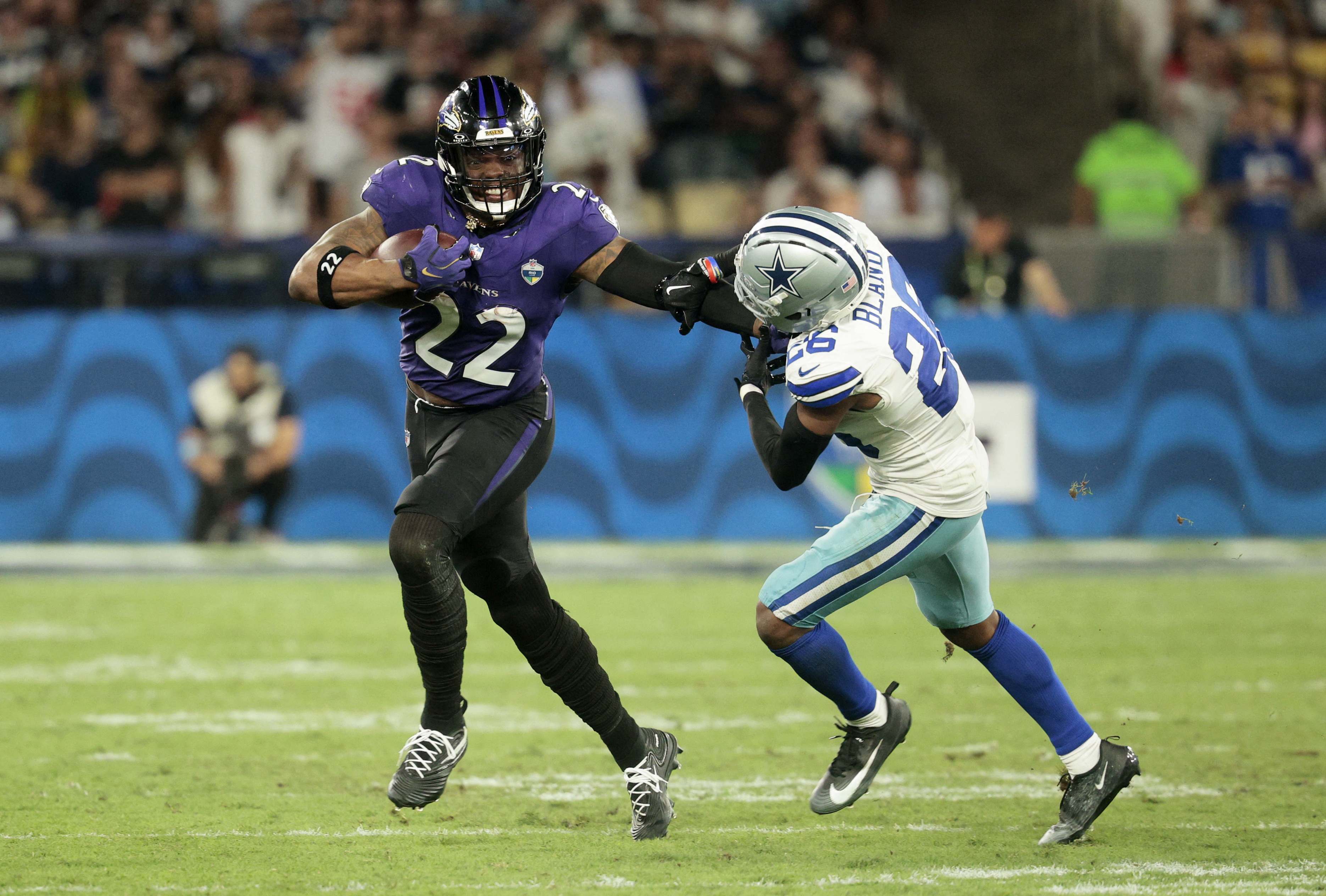 Pictured: Baltimore running back Derrick Henry in action as we break down our Titans vs. Ravens Prediction. Photo by REUTERS/Brian Snyder.