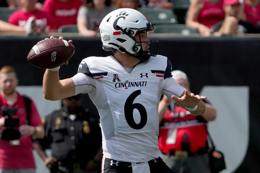 Ben Bryant of the Cincinnati Bearcats throws a pass in the first quarter against the Miami (OH) RedHawks at Paycor Stadium.