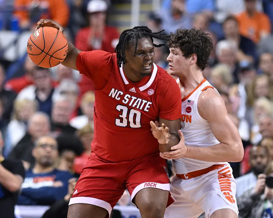 D.J. Burns Jr. #30 of the North Carolina State Wolfpack posts up as we look at our NC State vs. Duke Elite Eight March Madness expert pick and best bet