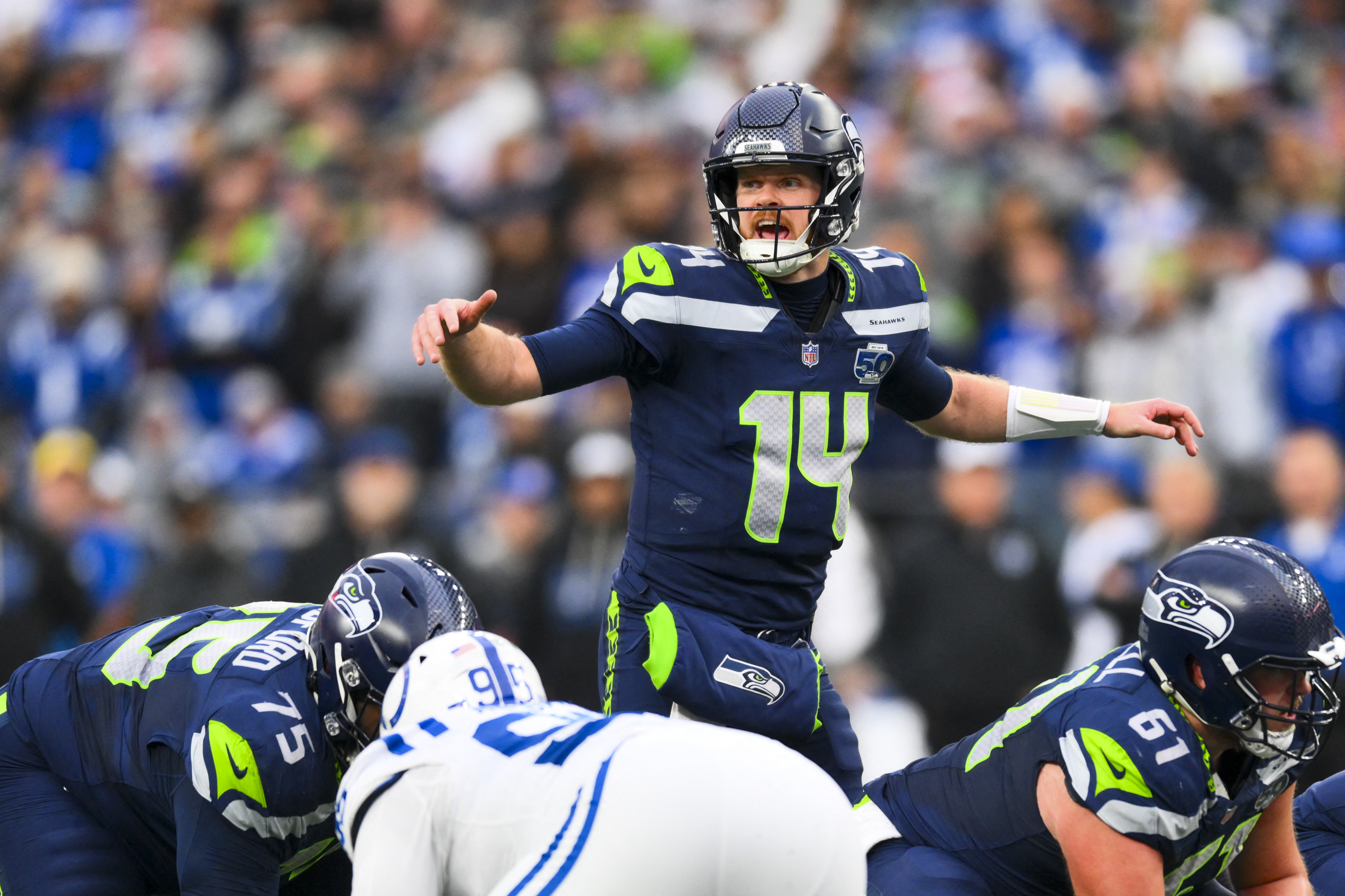 Seattle Seahawks quarterback Sam Darnold (14) audibles over center as we break down our NFL QB rankings.