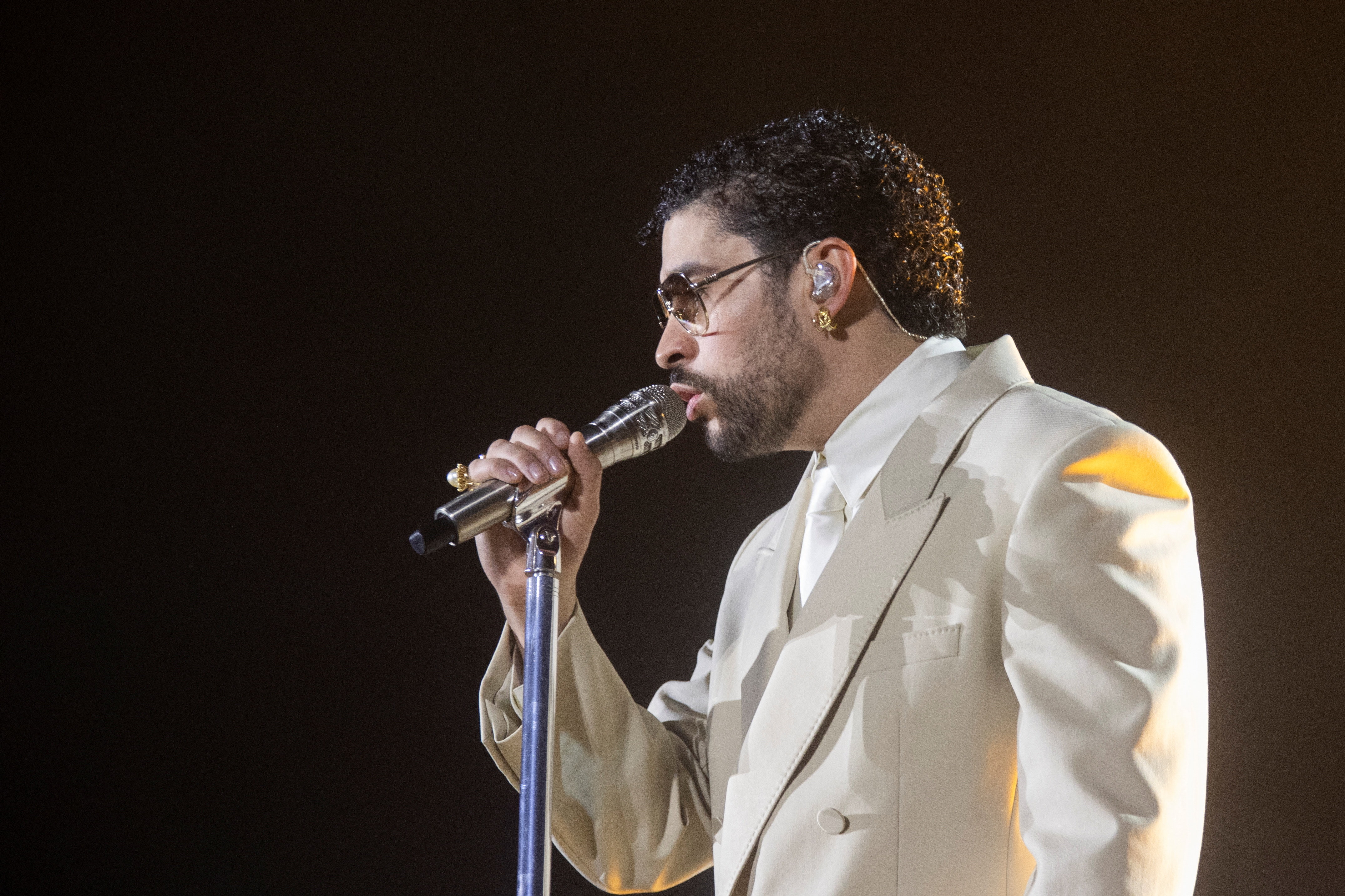 Puerto Rican singer Bad Bunny performs during a concert as we break down Bad Bunny lyrics to know before the Super Bowl halftime show.