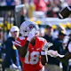 Marvin Harrison Jr. of the Ohio State Buckeyes makes a touchdown catch against the Michigan Wolverines who are the favorites in our Big Ten Conference odds preview.