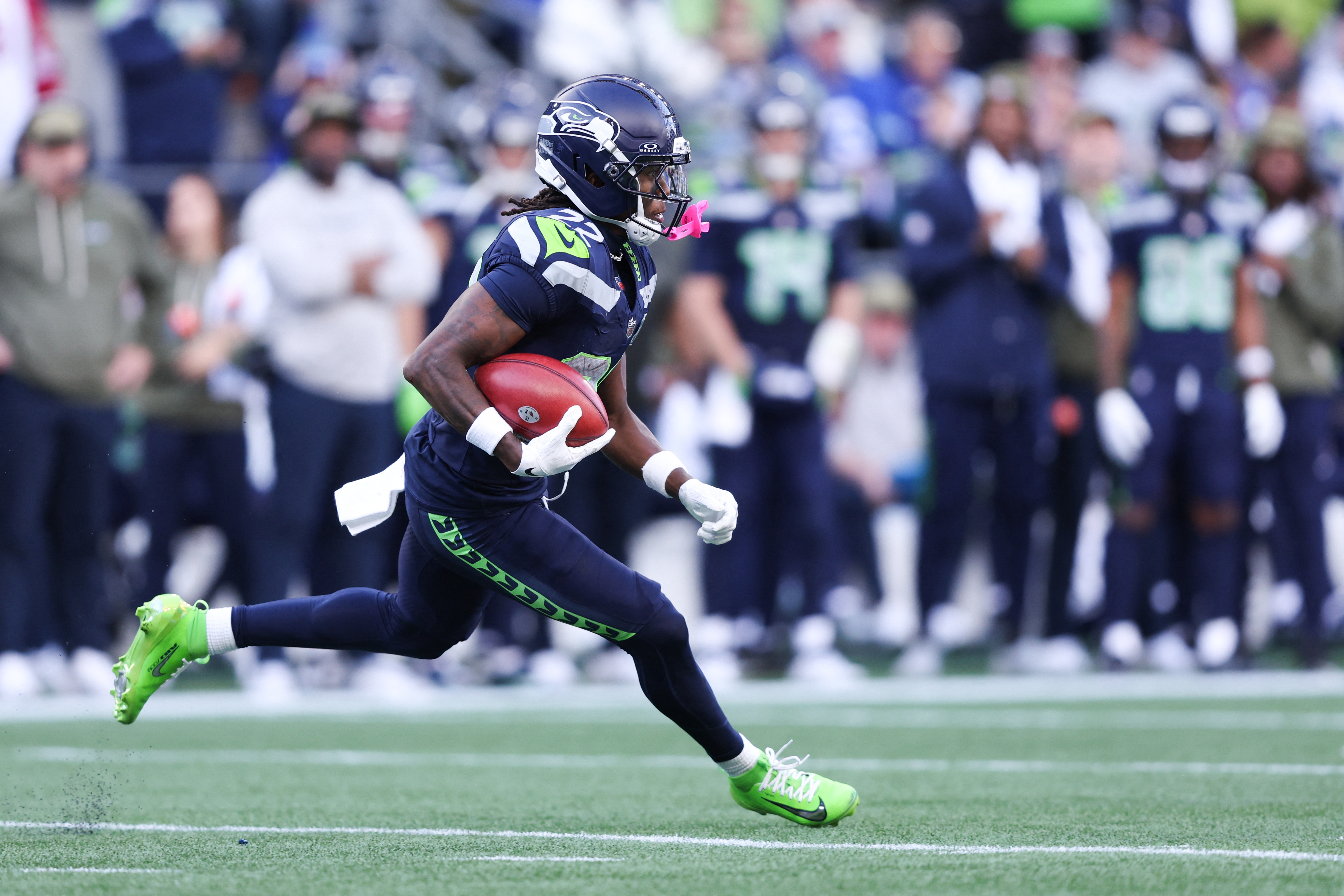 Seattle Seahawks wide receiver Rashid Shaheed (22) runs with the ball as explain how to bet on the Super Bowl opening kickoff odds.