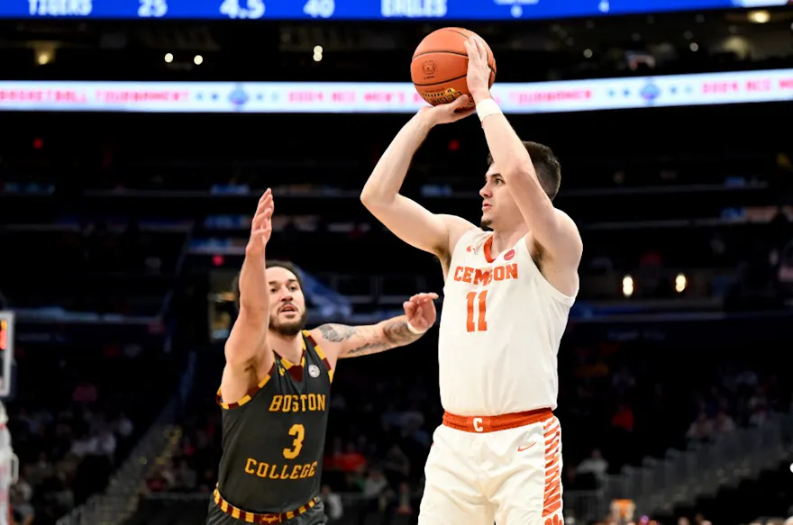 Joseph Girard III #11 of the Clemson Tigers shoots the ball in the first half against Jaeden Zackery #3 of the Boston College Eagles as we make our New Mexico vs. Clemson March Madness prediction. 