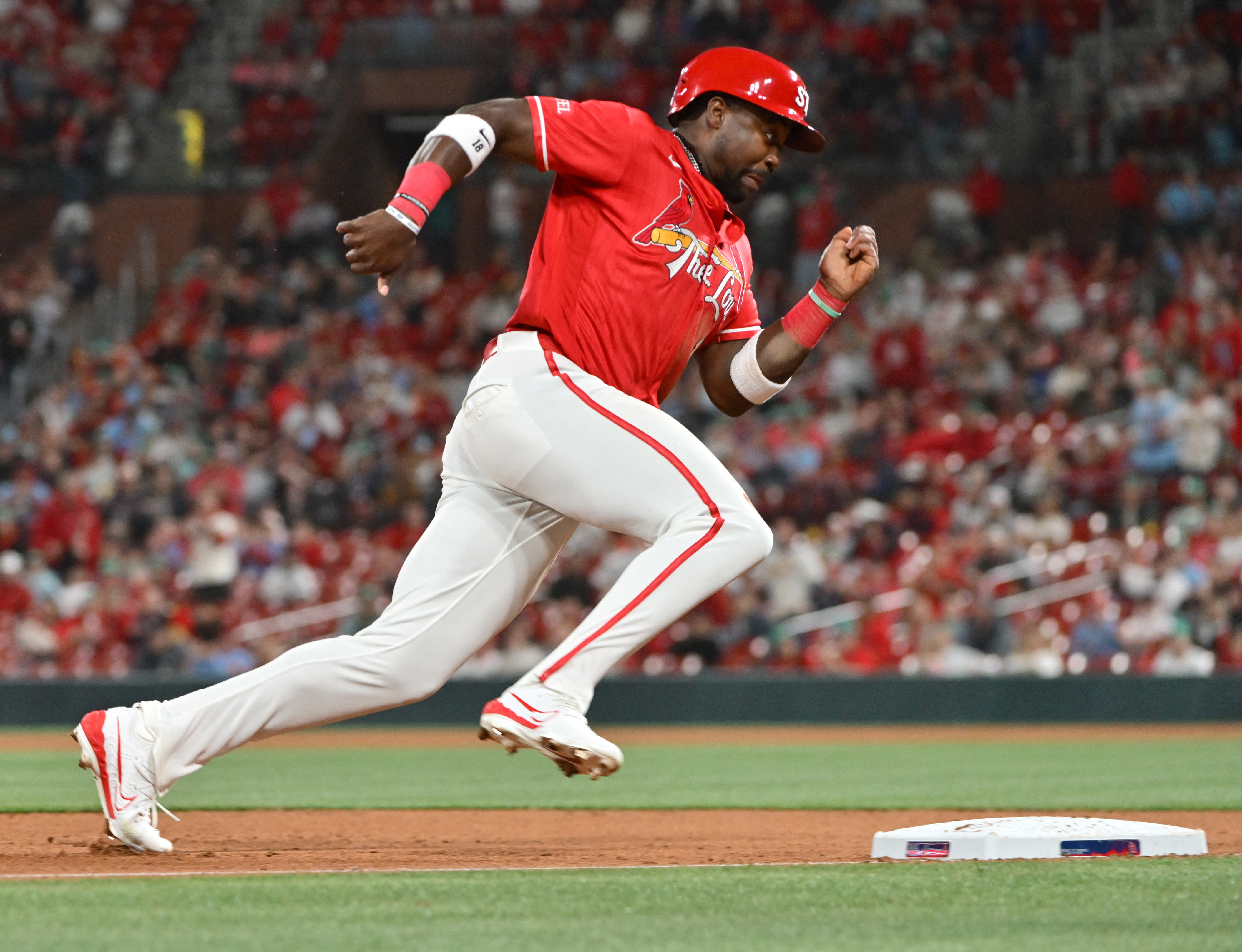St. Louis Cardinals right fielder Jordan Walker (18) heads to third base as we break down our Red Sox vs. Cardinals prediction.
