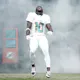 Tyreek Hill #10 of the Miami Dolphins runs onto the field during team introductions