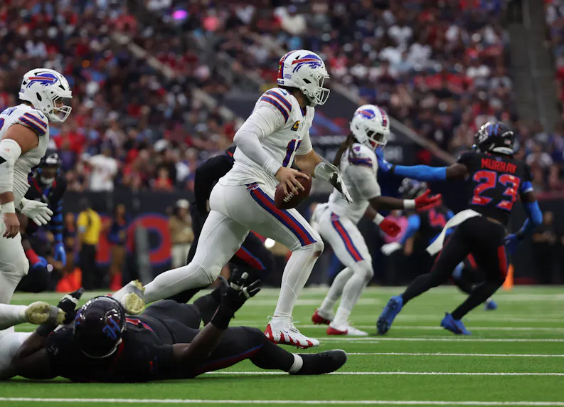 Buffalo Bills quarterback Josh Allen rushes as we offer our NFL Week 6 predictions and picks.