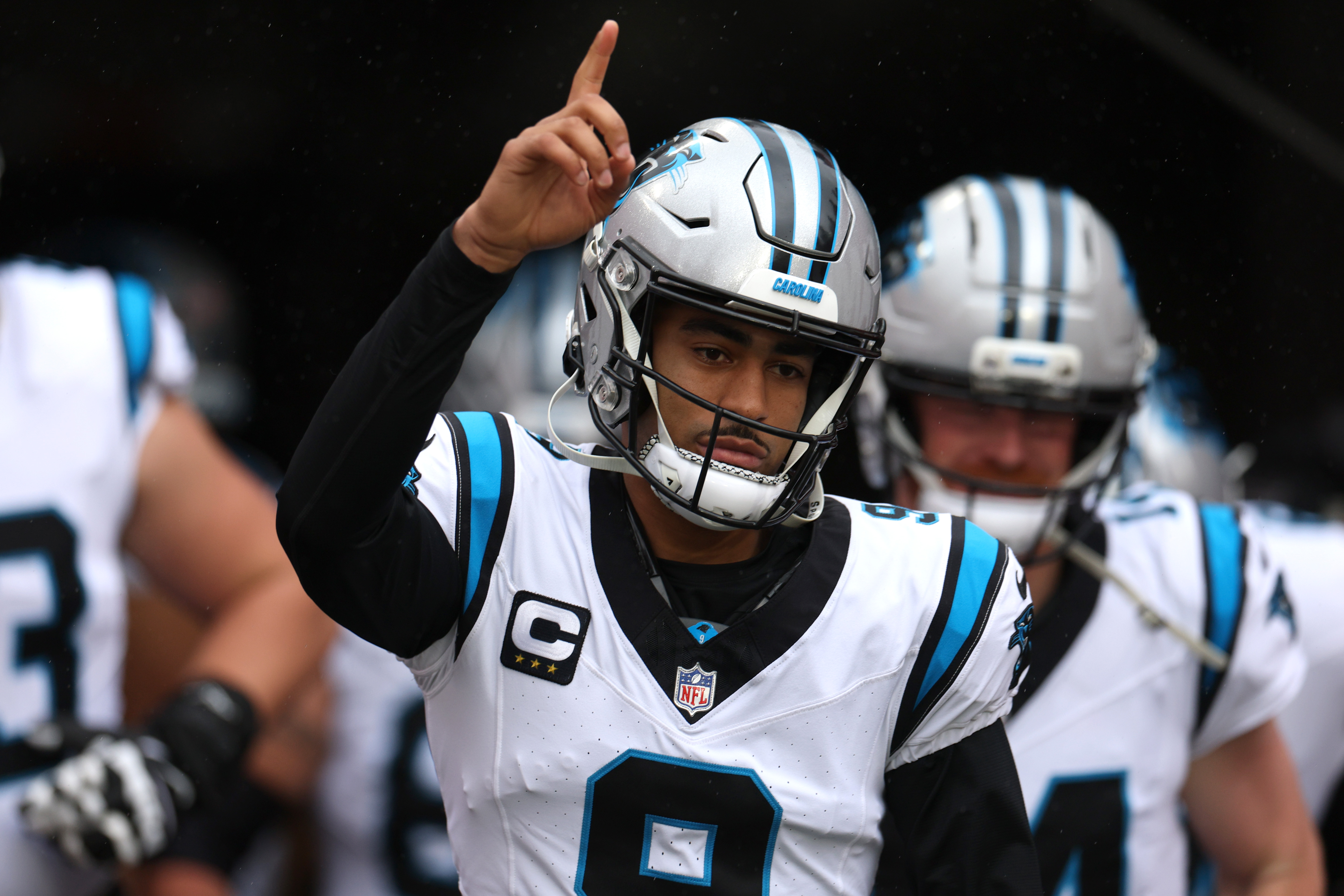 Carolina Panthers quarterback Bryce Young (9) runs onto the field as we break down our Rams vs. Panthers predictions and opening odds.