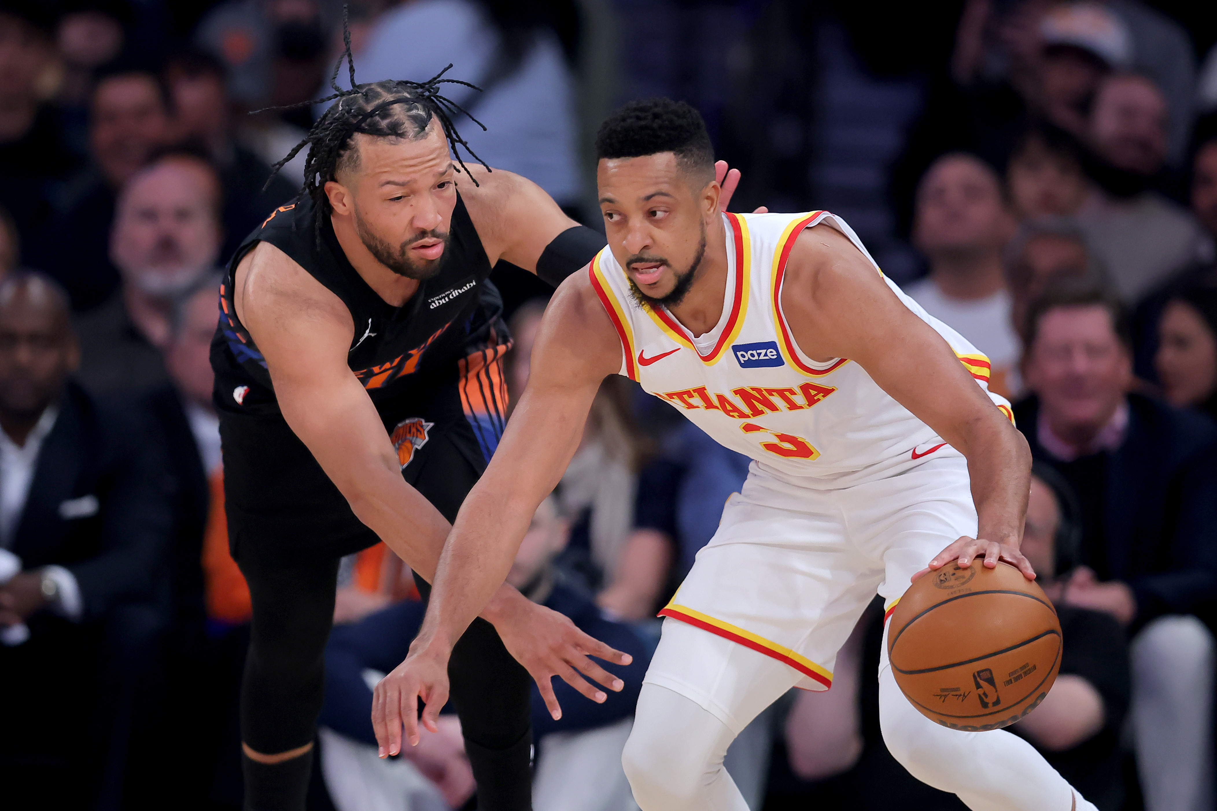 Atlanta Hawks guard CJ McCollum controls the ball against New York Knicks guard Jalen Brunson as we provide our Knicks vs. Hawks player props