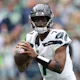 Geno Smith #7 of the Seattle Seahawks looks to pass as we look at the Monday Night Football odds for Week 4