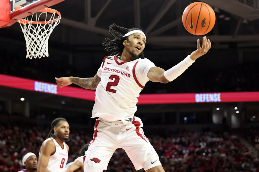 Arkansas Razorbacks guard Boogie Fland rebounds as we make our best Florida vs. Arkansas prediction.