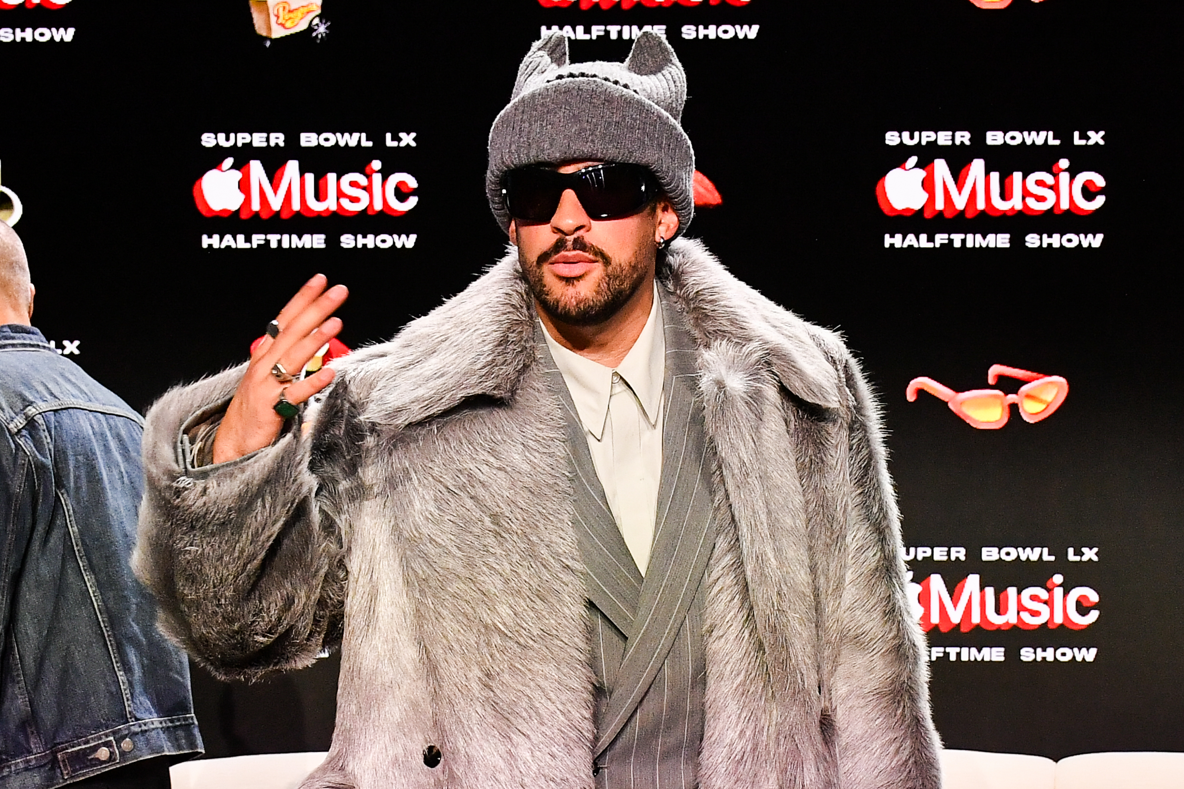 Bad Bunny at the halftime show press conference, and we're exploring how he'll kick off his performance with our look at the Super Bowl halftime show first song odds at prediction markets. 