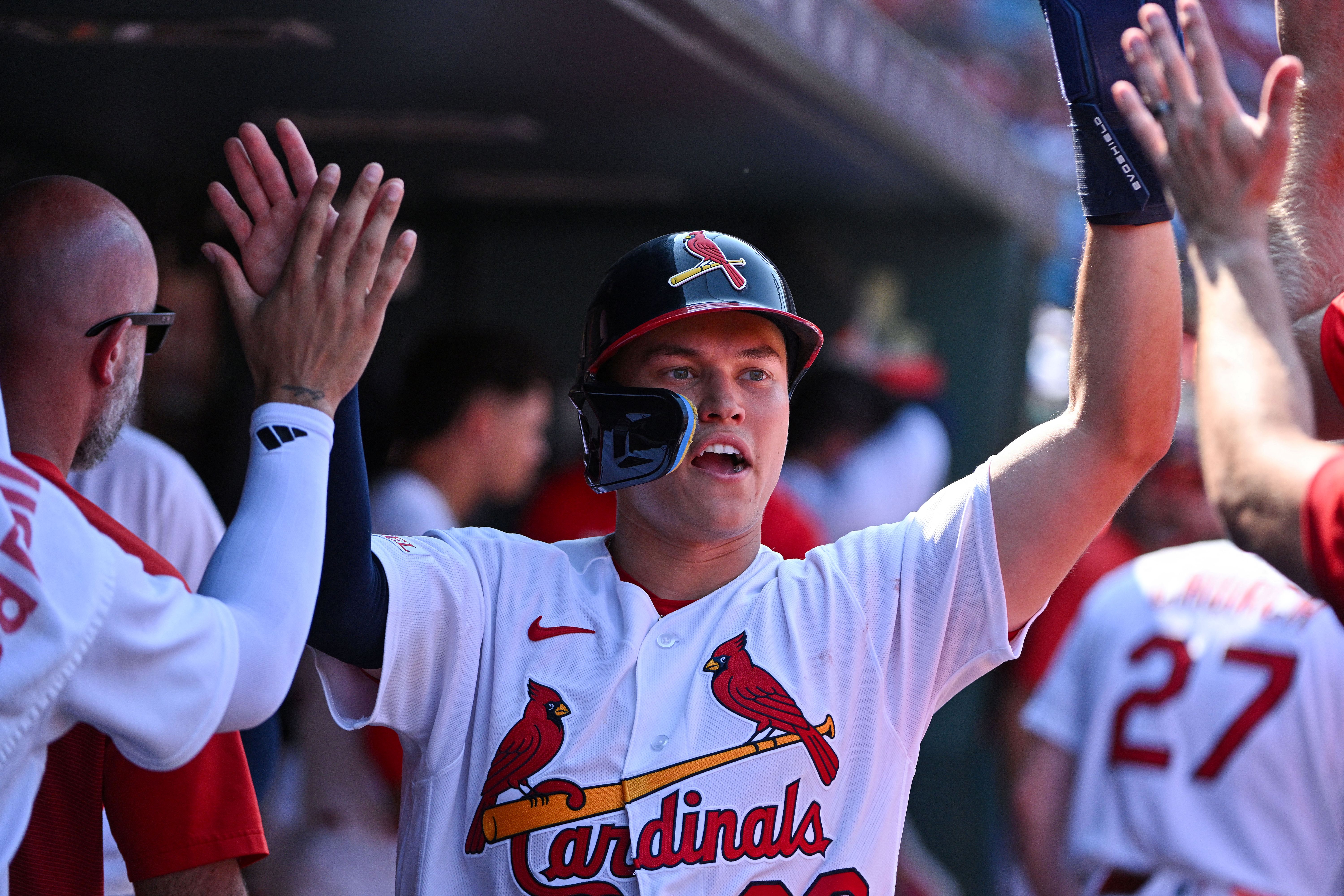 St. Louis Cardinals second baseman JJ Wetherholt is congratulated by teammates as we make our best Cardinals vs. Cubs prediction