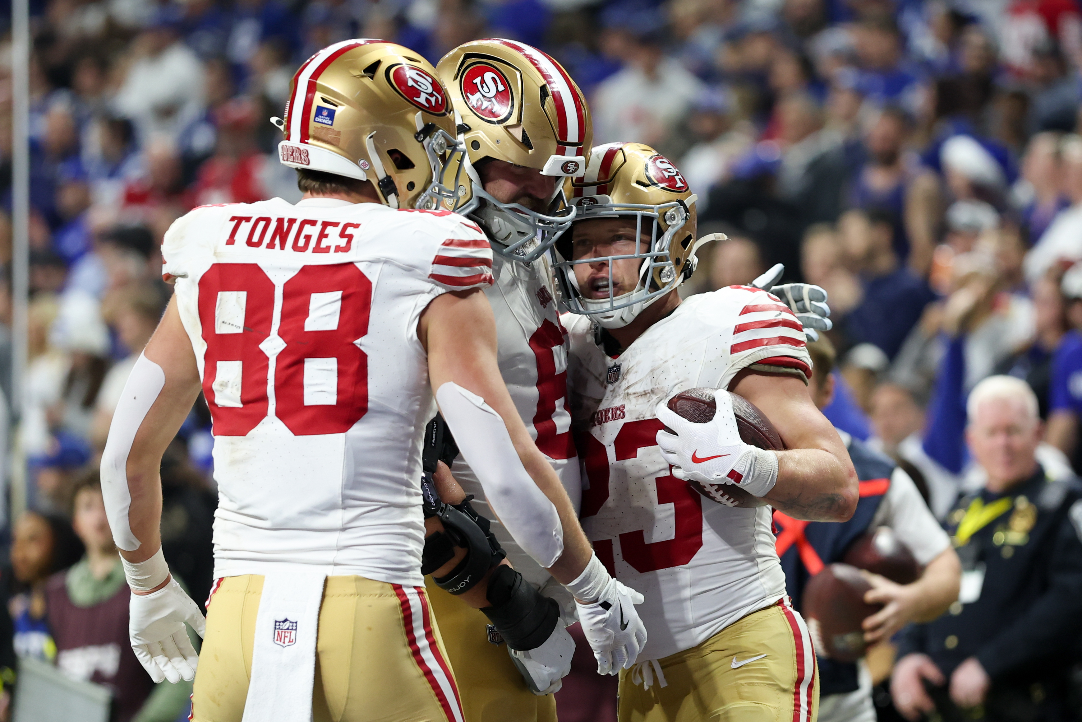 San Francisco 49ers running back Christian McCaffrey (23) celebrates with tight end Jake Tonges (88) and fullback Kyle Juszczyk (44) as we break down our Bears vs. 49ers expert picks for Sunday Night Football.