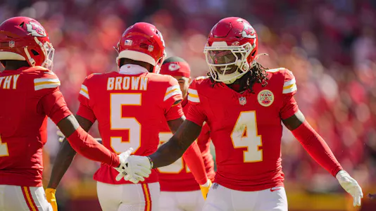 Rashee Rice celebrates with wide receiver Xavier Worthy after a touchdown as we offer our Commanders vs. Chiefs Prediction