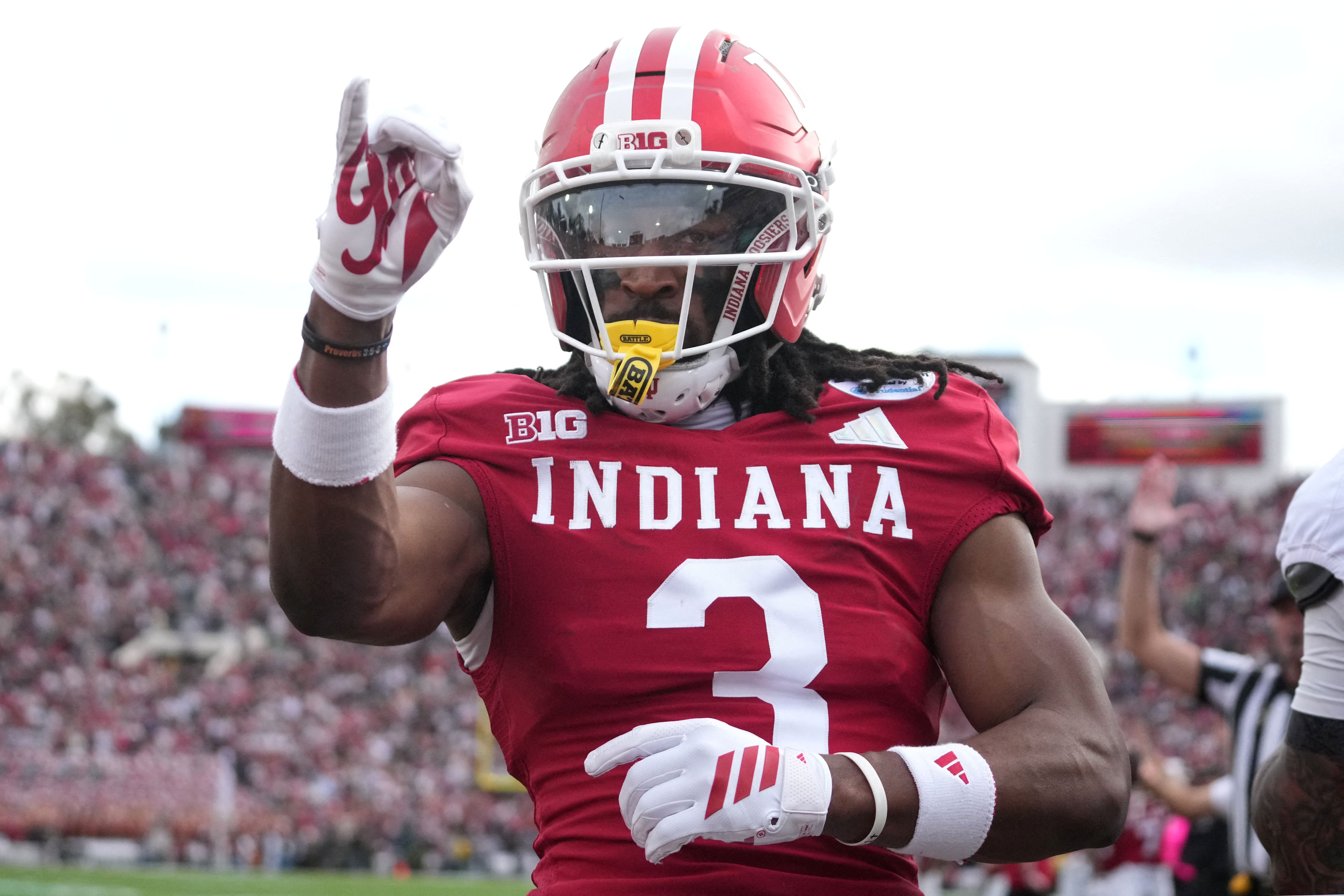 Indiana Hoosiers wide receiver Omar Cooper Jr. (3) celebrates as we break down the latest Miami vs. Indiana odds movement for the CFP National Championship.