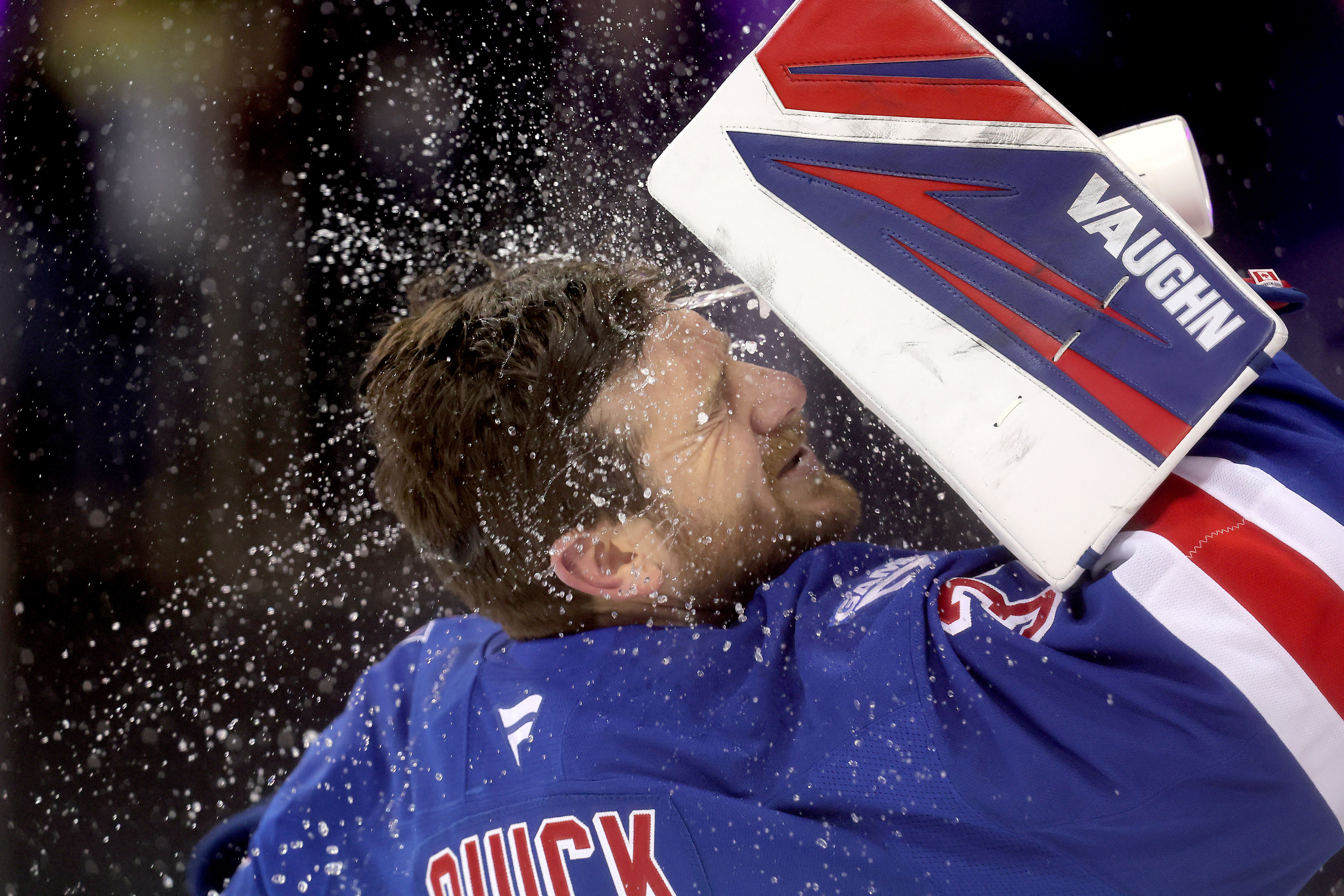 New York Rangers goaltender Jonathan Quick sprays water on his face as we look at New York turning to tech to tighten sports betting control.