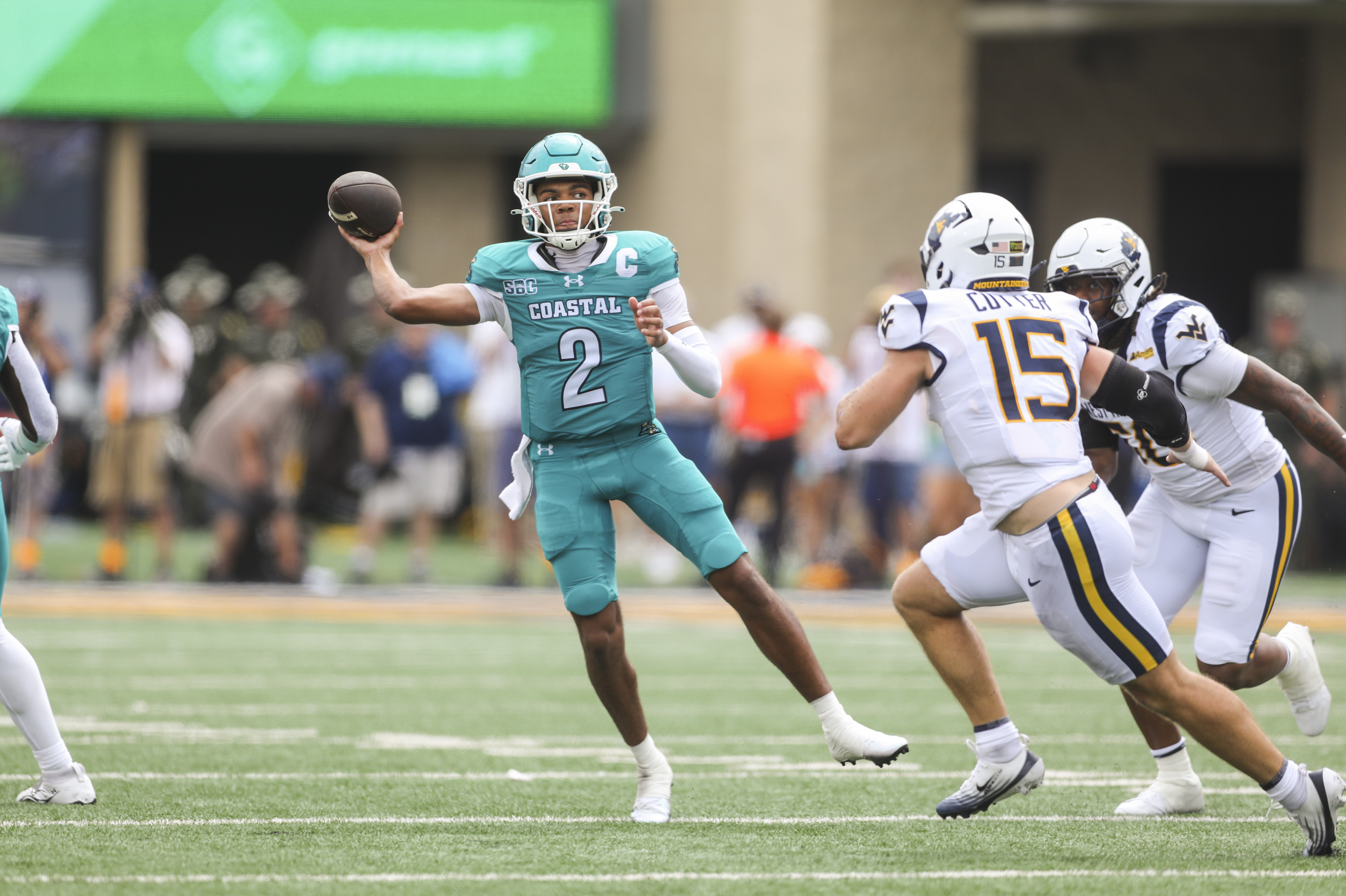 Coastal Carolina Chanticleers quarterback Deuce Bailey (2) throws a pass as he is featured in our Liberty vs. Coastal Carolina prediction.