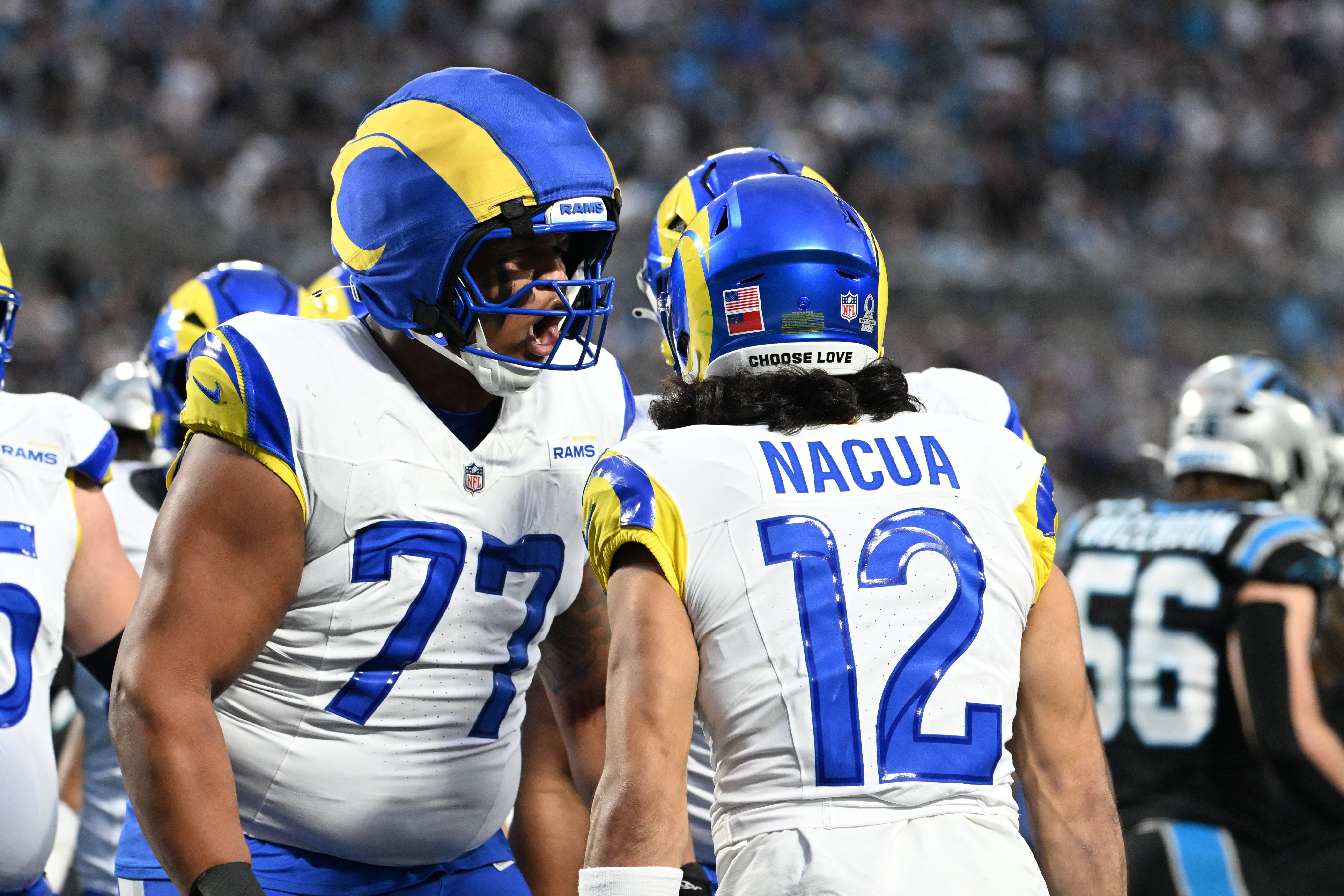 Los Angeles Rams wide receiver Puka Nacua celebrates with offensive tackle Alaric Jackson as we look at the best Rams vs. Bears prediction markets.