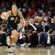 Kelsey Plum of the Las Vegas Aces brings the ball up the court as we look at our WNBA Championship picks and predictions