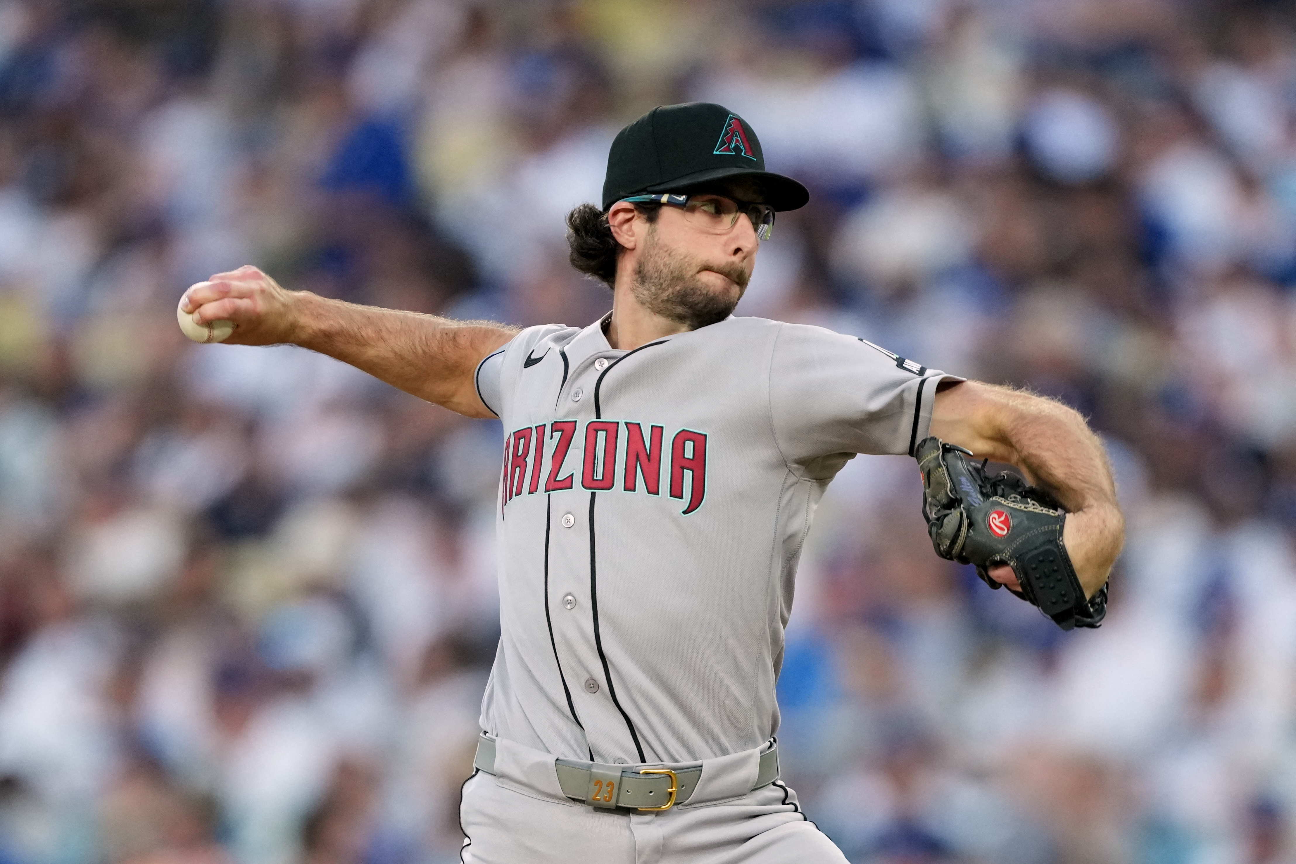Arizona Diamondbacks starting pitcher Zac Gallen (23) throws a pitch as we break down the Diamondbacks vs. Cardinals win probability.