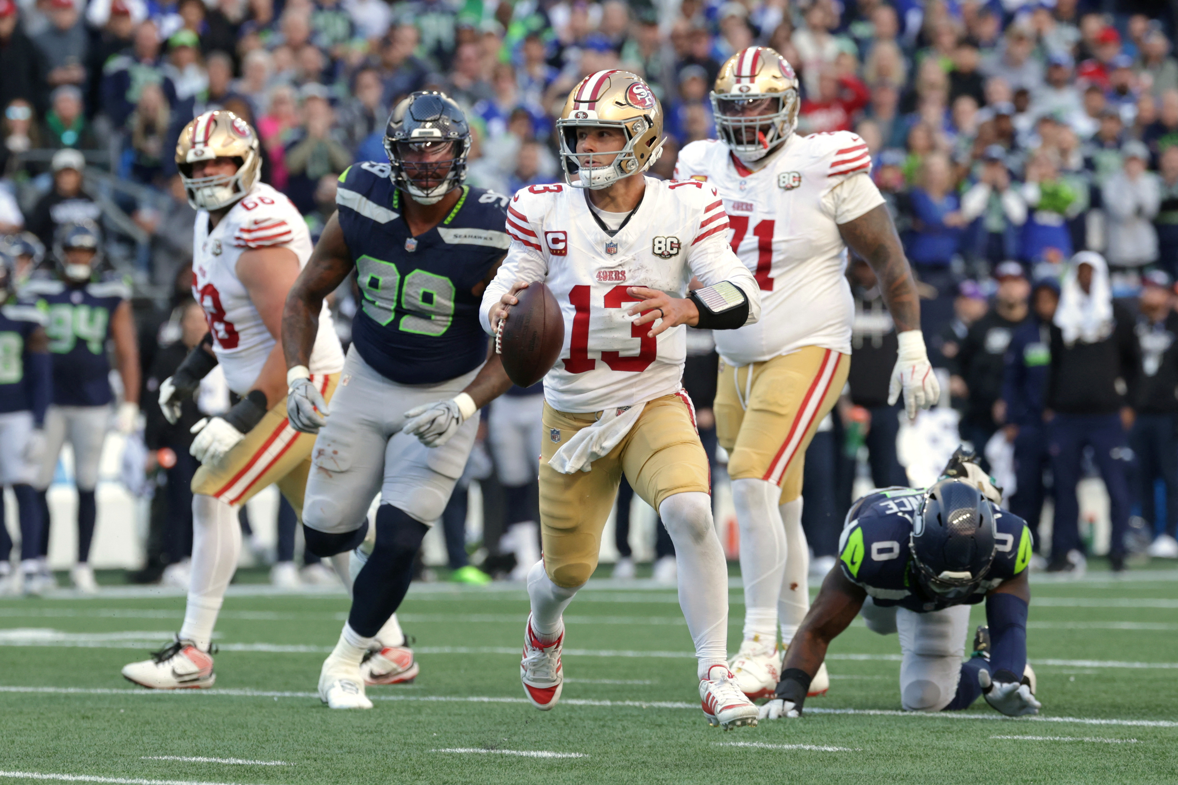 Pictured: 49ers quarterback Brock Purdy in action as we break down our NFL AI Predictions: Week 6 ATS Picks & Score Projections for Every Matchup. Photo by Joe Nicholson-Imagn Images.
