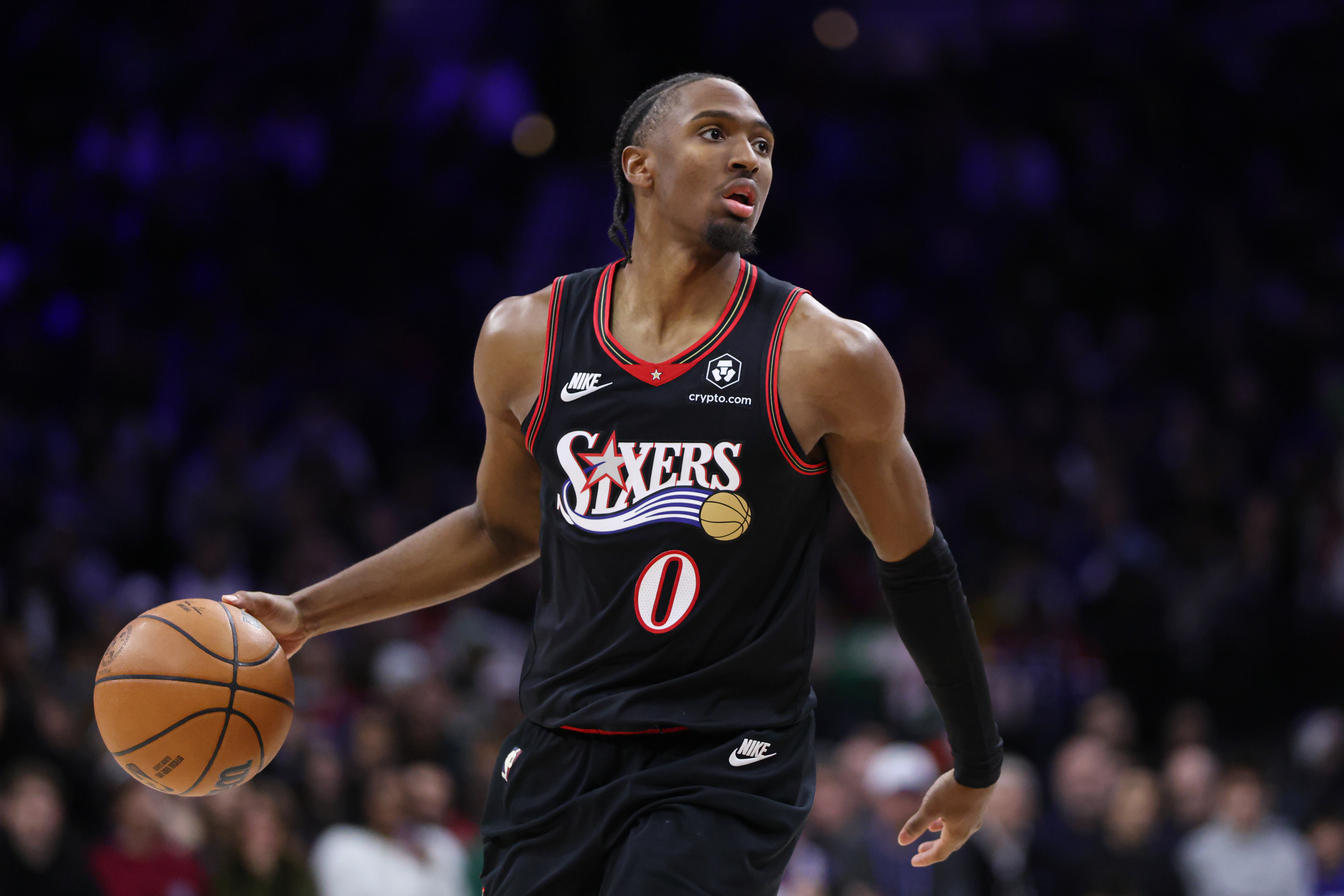 Philadelphia 76ers guard Tyrese Maxey (0) dribbles the ball as he is featured in our 76ers vs. Bulls player props.