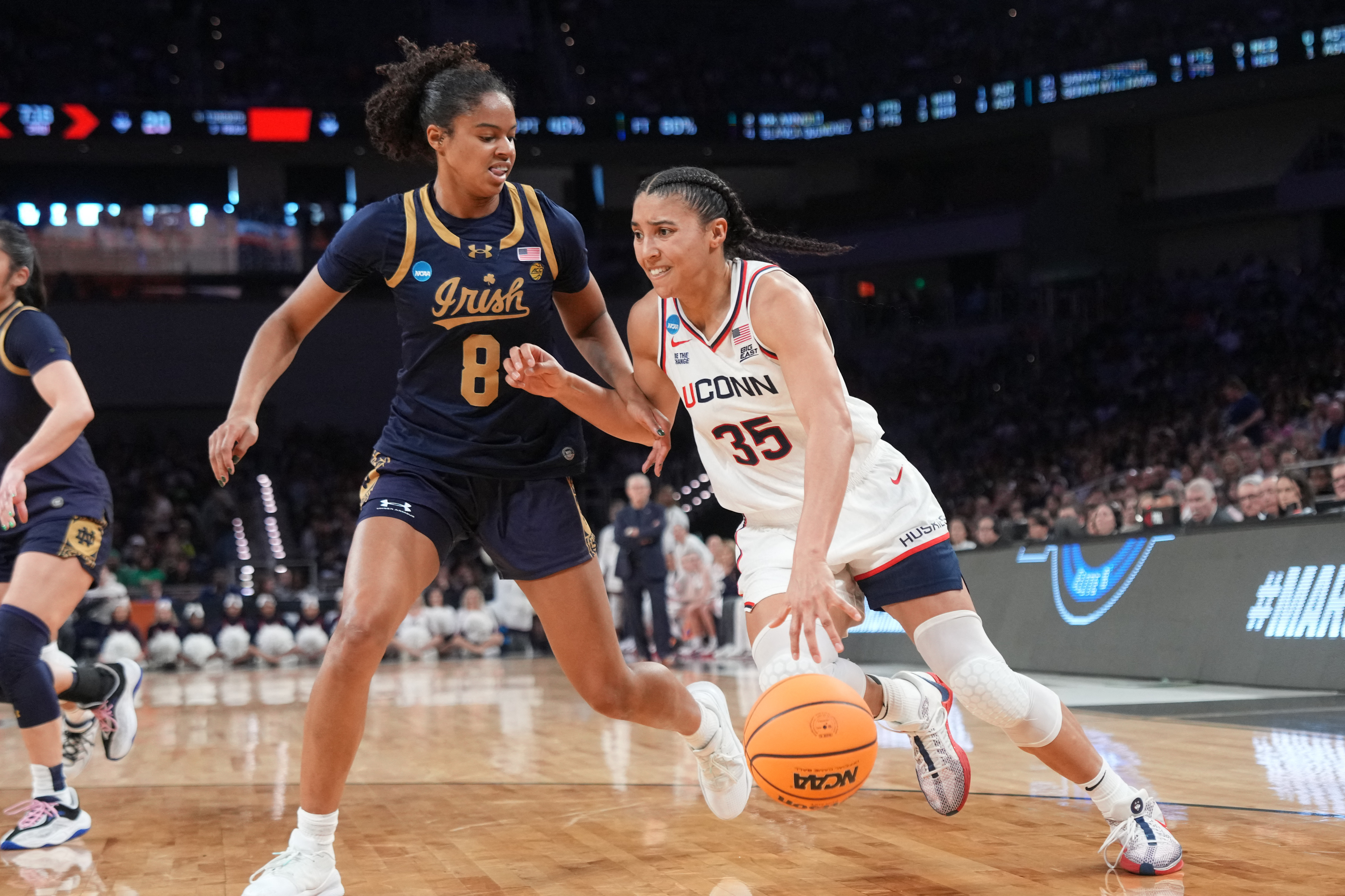 UConn's Azzi Fudd (35) has the Huskies atop the women's March Madness odds.