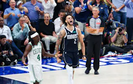 Dallas Mavericks center Dereck Lively II reacts in front of Boston Celtics guard Jrue Holiday as we look at the best 2023-24 NBA Finals odds.