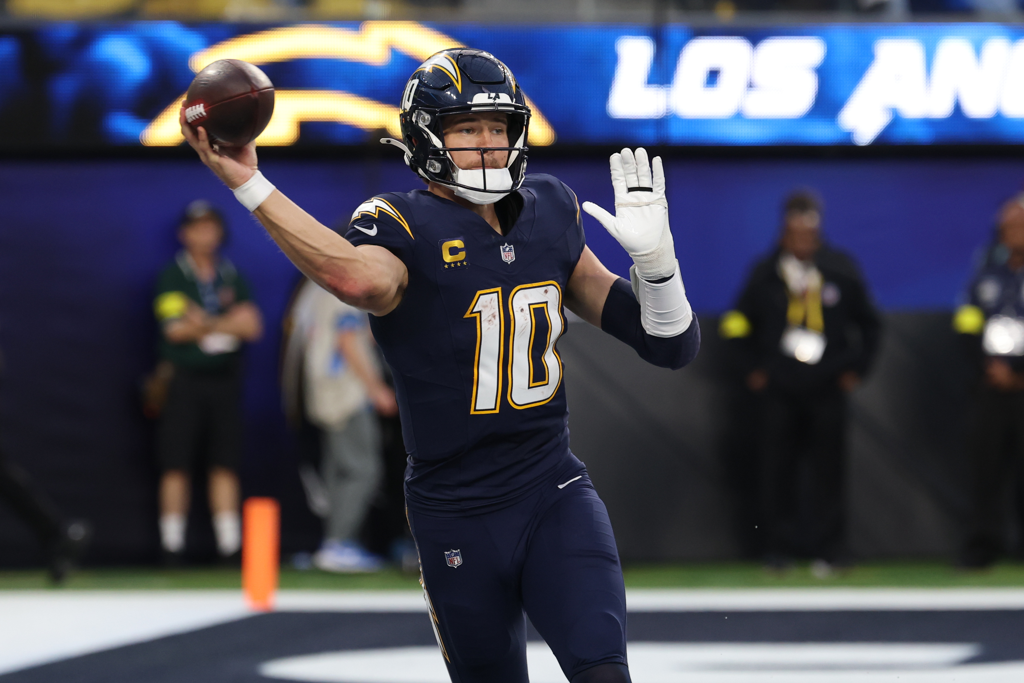 Los Angeles Chargers quarterback Justin Herbert (10) throws a pass as we break down our Wild Card Round long shot parlay.