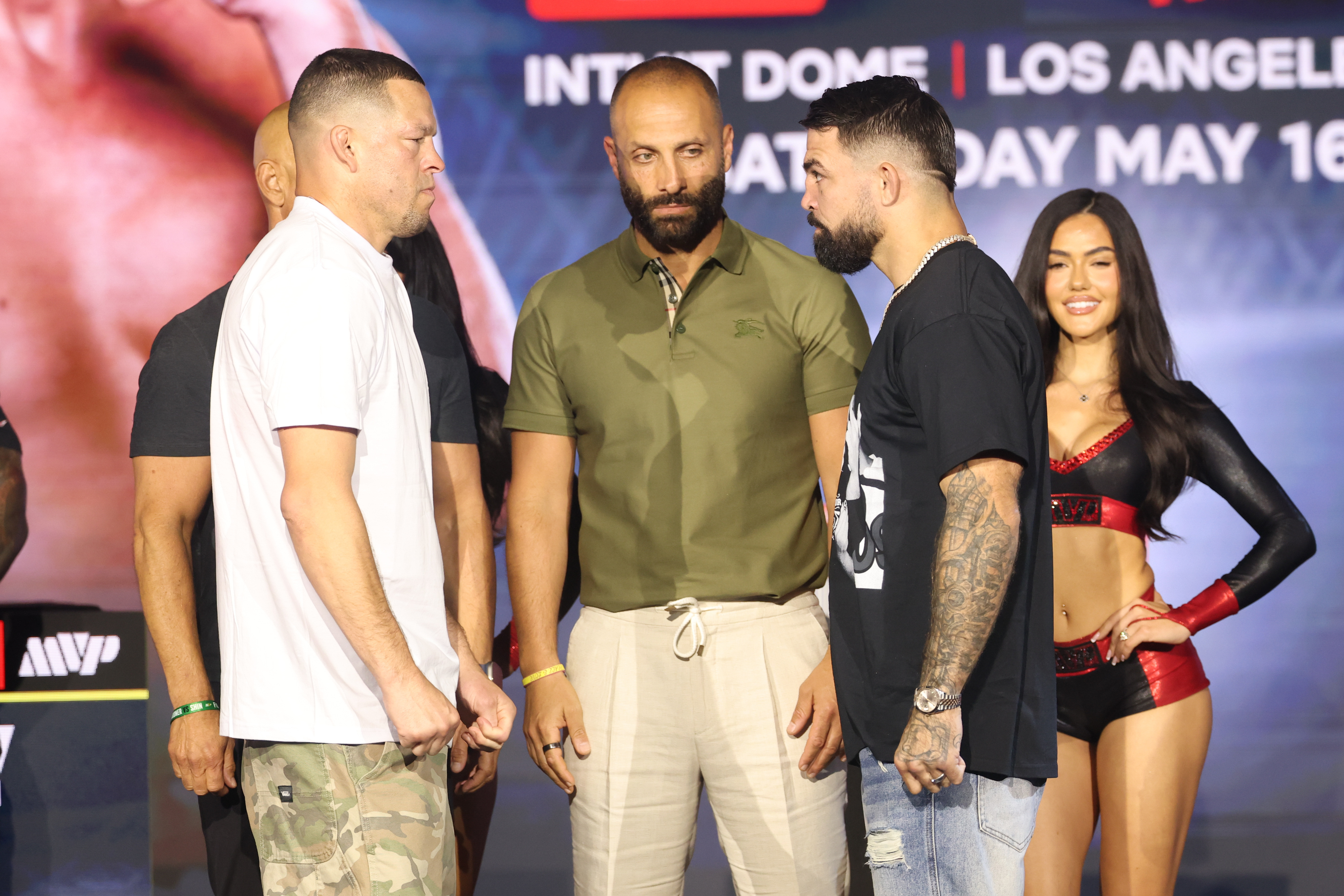 Nate Diaz and Mike Perry pose after the press conference for the Most Valuable Promotions MMA card as we break down our Nate Diaz vs. Mike Perry prediction.