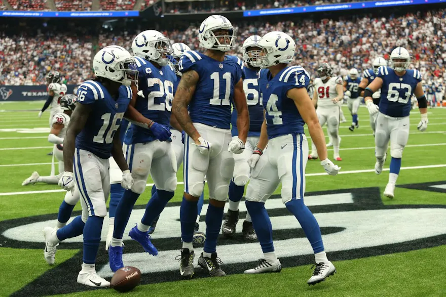 Michael Pittman Jr. of the Indianapolis Colts celebrates with teammates after scoring a touchdown during the fourth quarter against the Houston Texans.