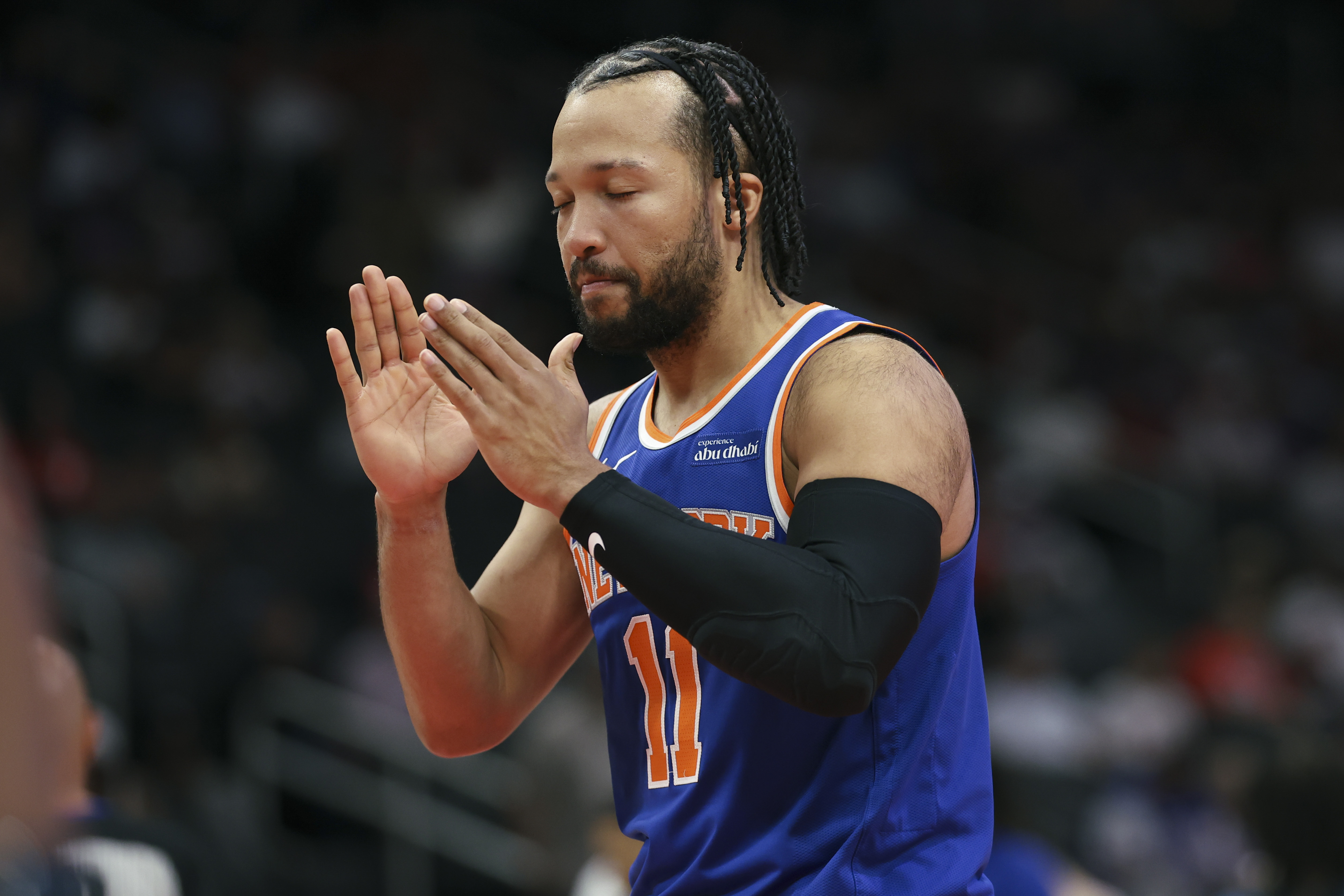 New York Knicks guard Jalen Brunson (11) walks on the court as we break down our NBA Parlay tonight.