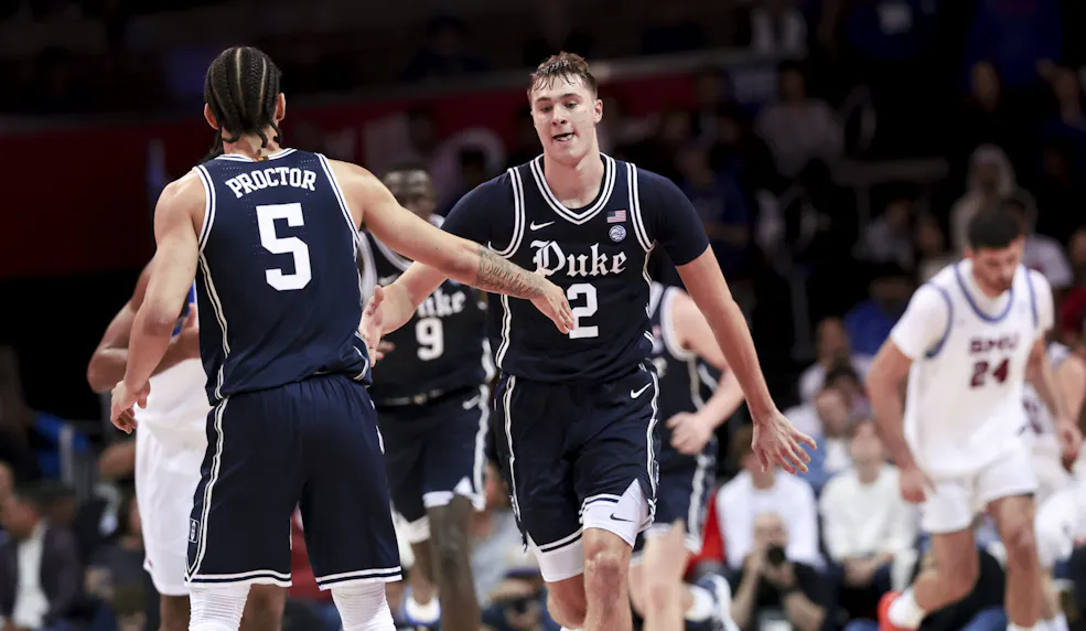 Duke Blue Devils guard Cooper Flagg (2) celebrates with Tyrese Proctor (5) as we look at our Notre Dame vs. Duke odds and predictions.