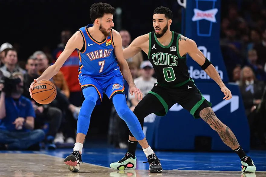Chet Holmgren #7 of the Oklahoma City Thunder handles the ball while being defended by Jayson Tatum as we look at our best NBA player props for Thunder vs. Celtics