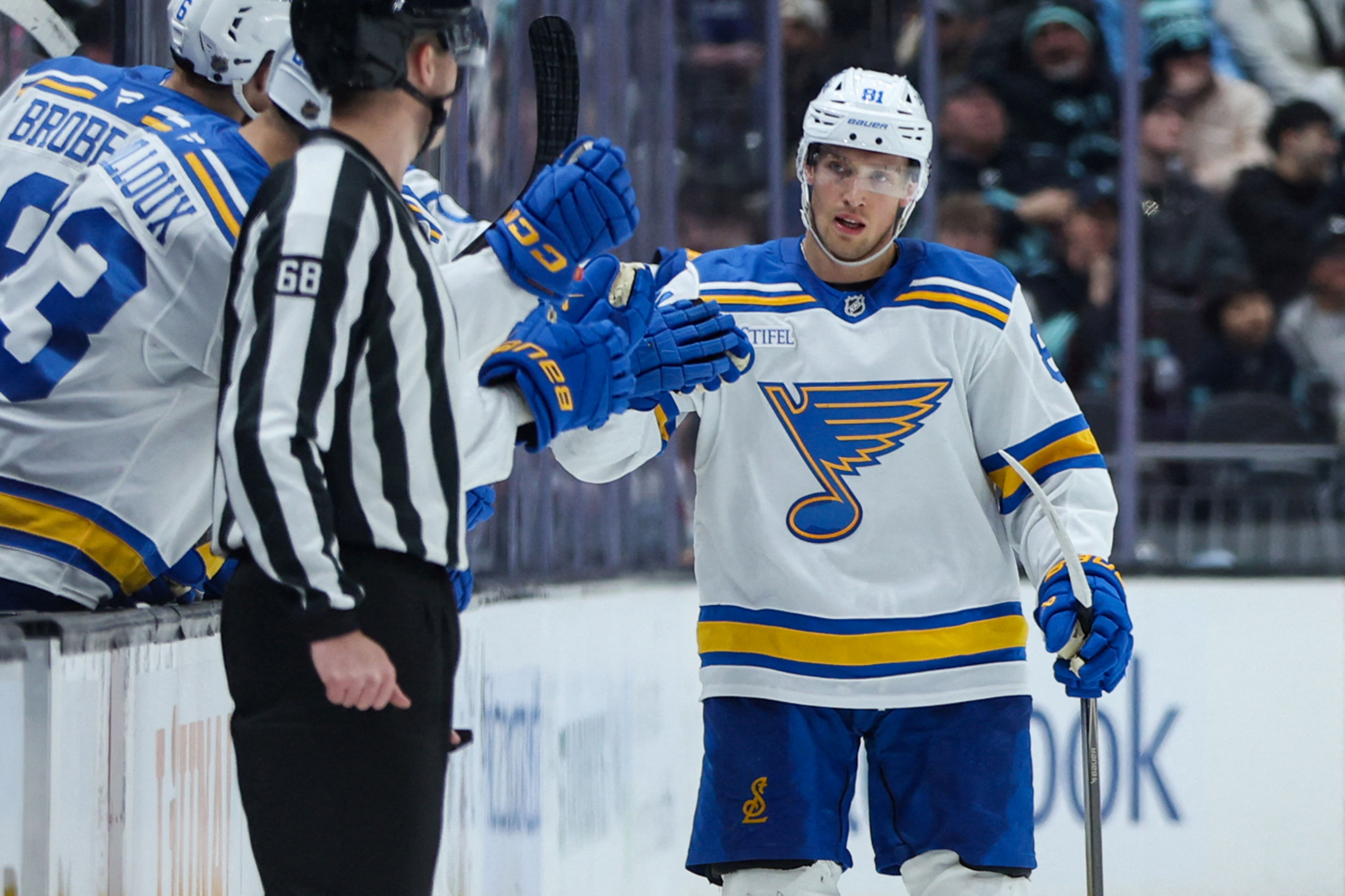 St. Louis Blues left wing Dylan Holloway celebrates scoring a goal, and he's key to our Blues vs. Mammoth prediction.