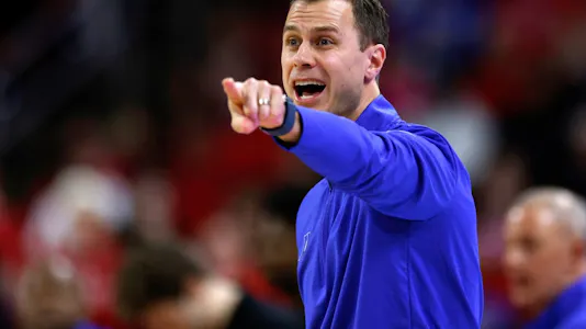 Head coach Jon Scheyer of the Duke Blue Devils directs his team as we make our best 2025 March Madness predictions with the opening odds for the 2025 NCAA Tournament.