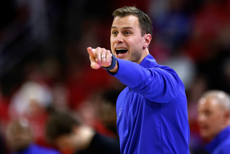 Head coach Jon Scheyer of the Duke Blue Devils directs his team as we make our best 2025 March Madness predictions with the opening odds for the 2025 NCAA Tournament.