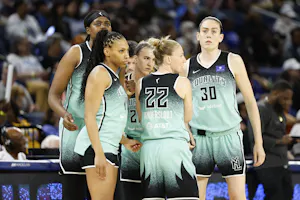 New York Liberty players look on as we offer our best Sparks vs. Liberty prediction and expert picks for Thursday's WNBA game at Barclays Center in Brooklyn, N.Y.