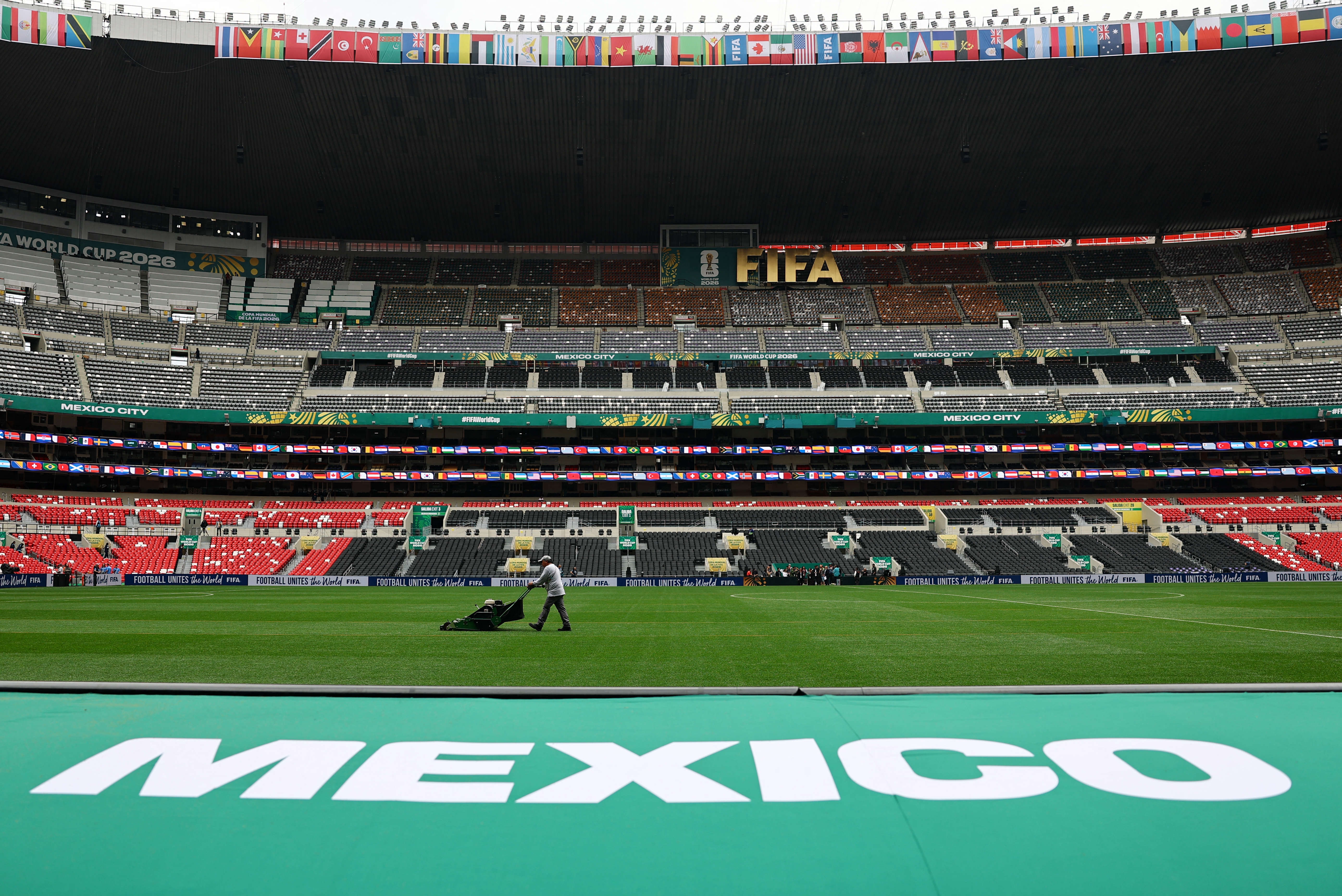 General view as workers prepare the pitch at Estadio Azteca in Mexico City ahead of World Cup 2026.