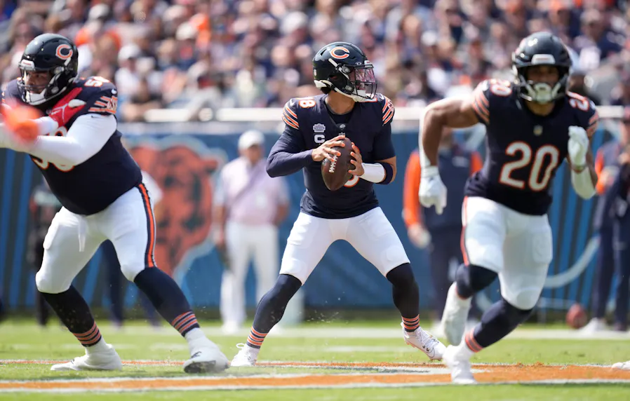 Chicago Bears quarterback Caleb Williams drops back to pass as we look at our Caleb Williams SNF player props for Bears vs. Texans.
