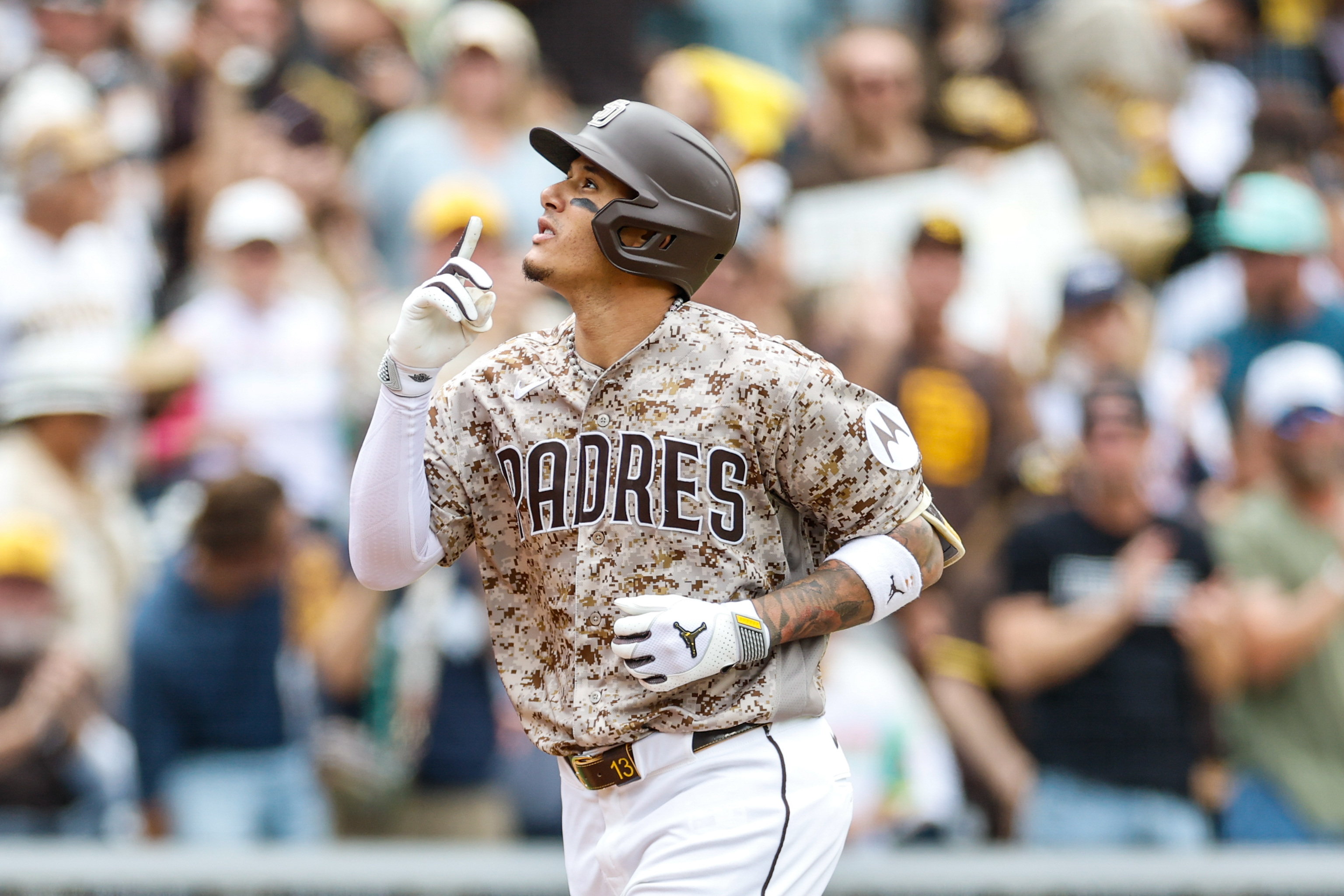 San Diego Padres third baseman Manny Machado (13) celebrates as we break down our Padres vs. Giants prediction tonight.
