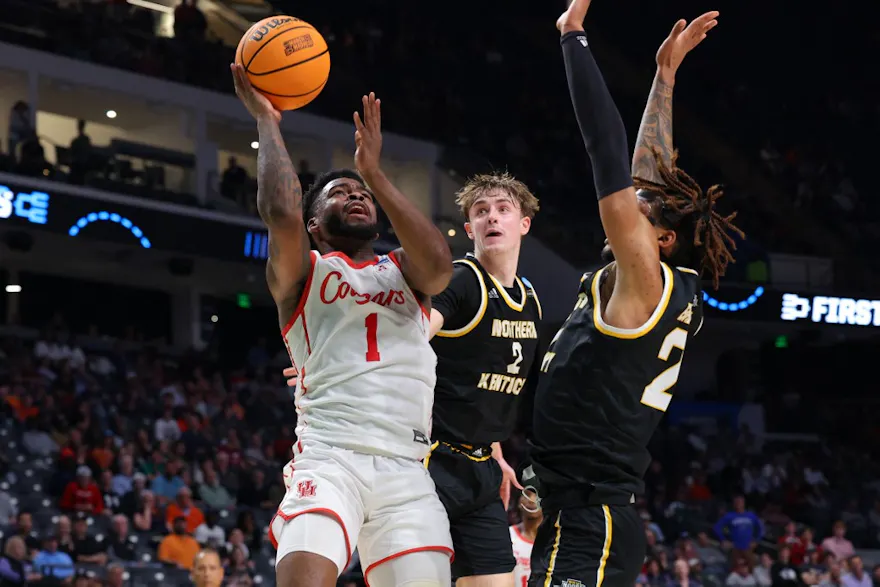 Jamal Shead #1 of the Houston Cougars drives to the basket as we look at our top Auburn vs. Houston prediction