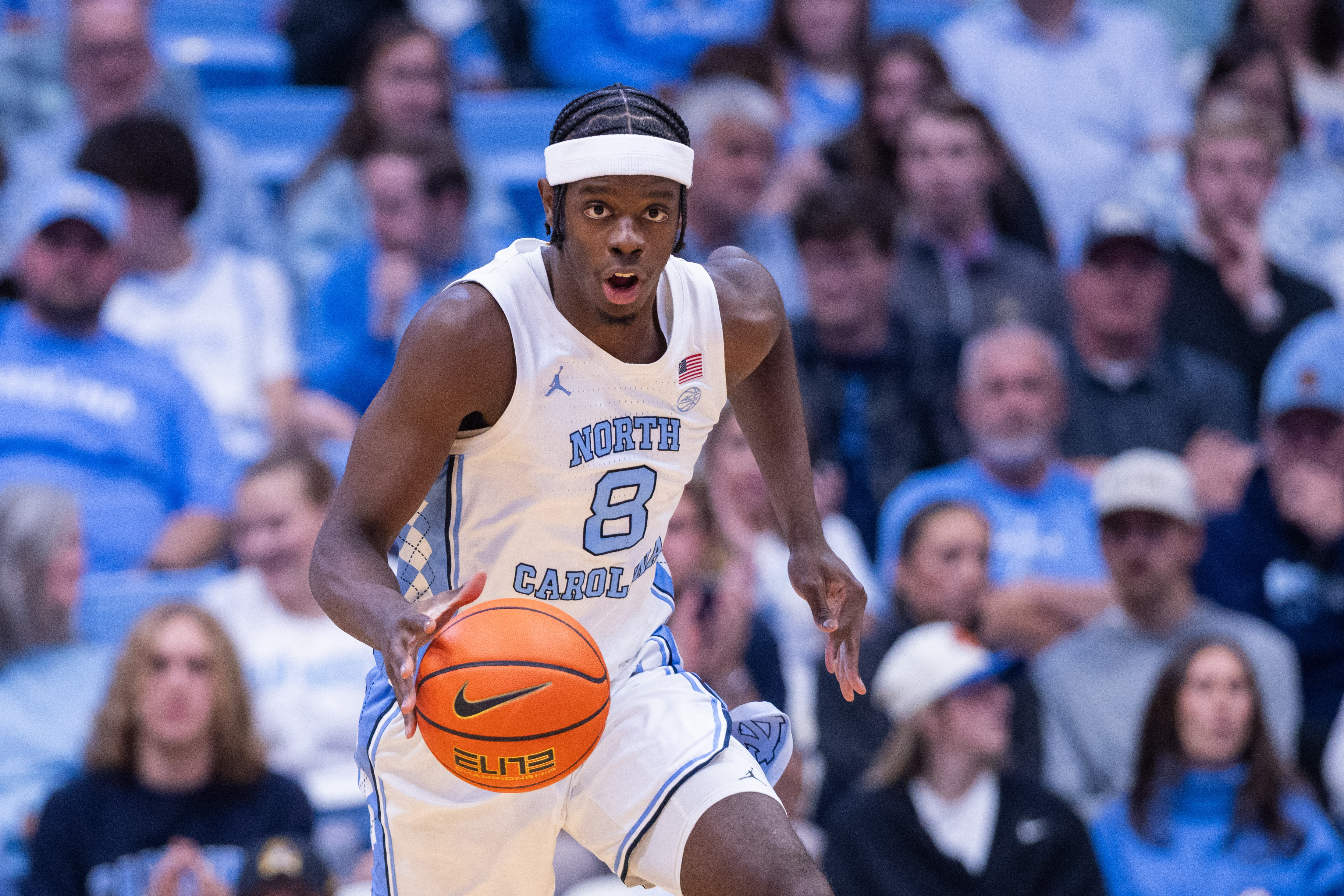 North Carolina Tar Heels forward Caleb Wilson (8) brings the ball up court as he is featured in our Florida State vs. North Carolina predictions & odds.