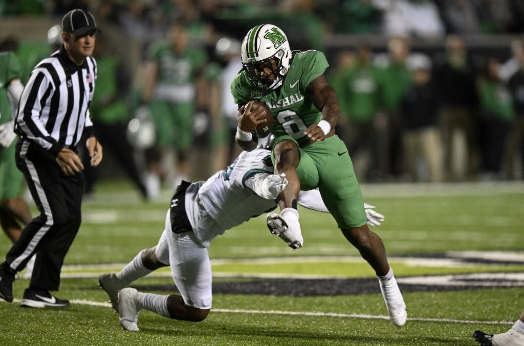 Khalan Laborn of the Marshall Thundering Herd rushes the ball in the second quarter of the game against the Coastal Carolina Chanticleers at Joan C. Edwards Stadium on October 29, 2022 in Huntington, West Virginia. Photo by Greg Fiume/Getty Images via AFP.
